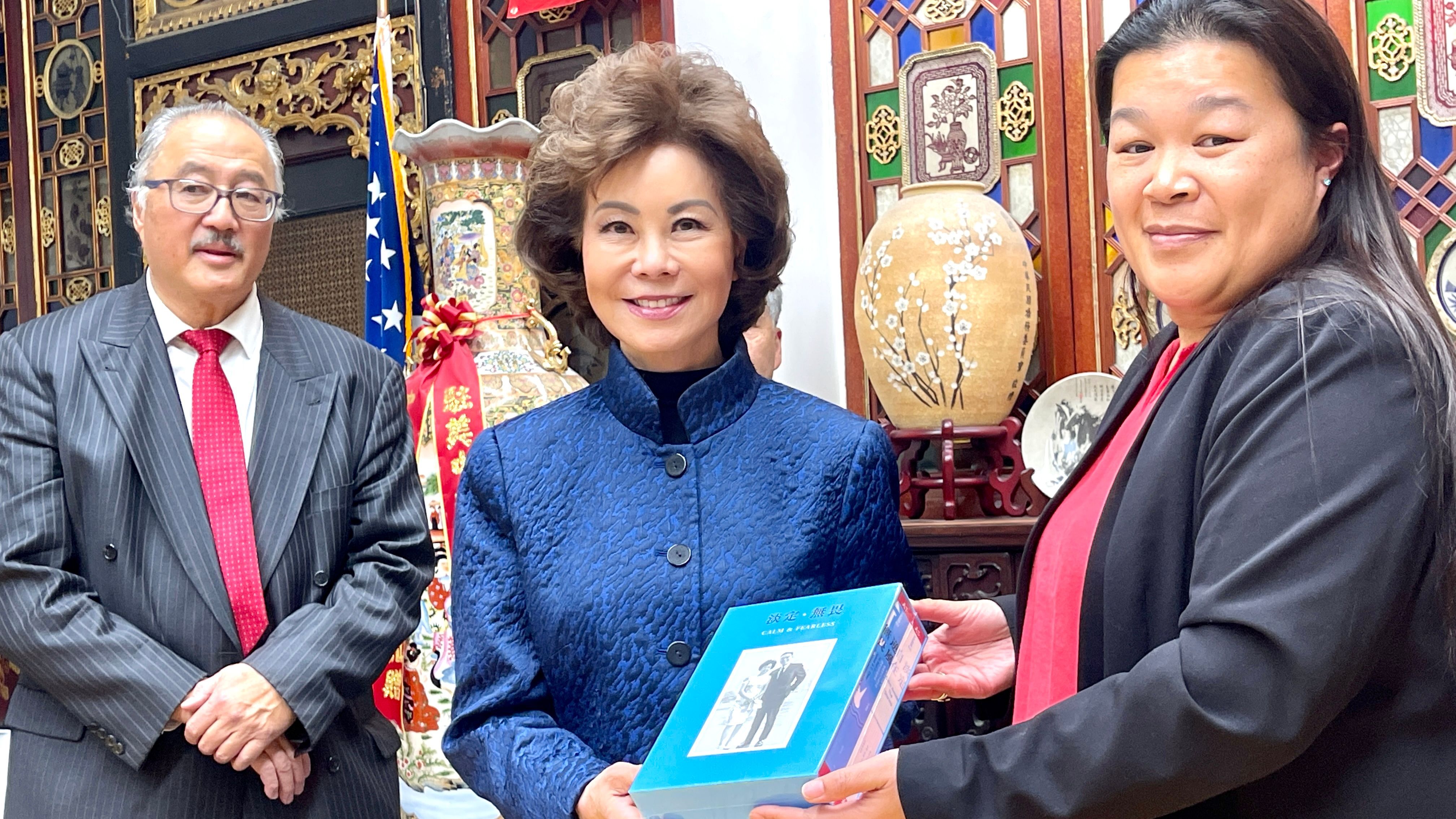 Elaine Chao presents her father’s book to Alisa Lam, Presiding President of CCBA. Photo by Portia Li