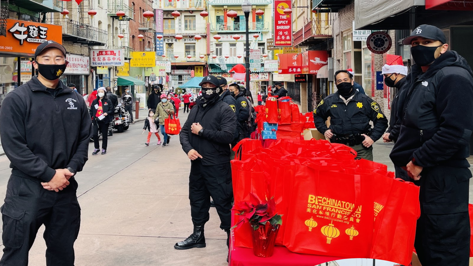 Police officers and Sheriff Deputies joined BeChinatown to distribute Christmas presents to SRO family children. Photo by Portia Li