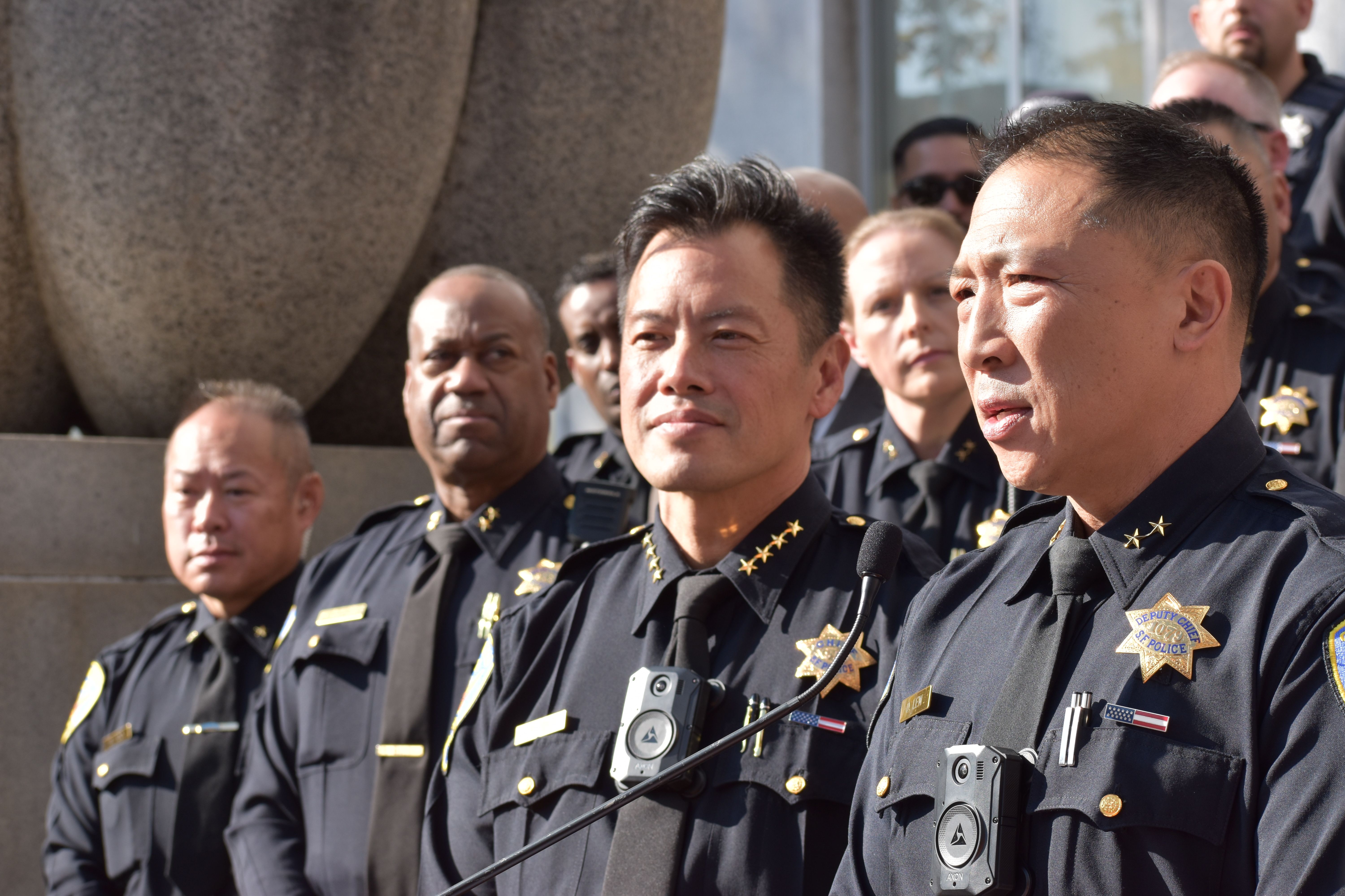Paul Yep (center) retired in 2023 as a Commander from the San Francisco Police Department and came back to serve as Interim Police Chief in June 2025 until December 20, 2025. Currently Yep serves as the Special Advisor in the SFPD to assist newly-appointed Police Chief Derrick Lew (first from far right) in transition. Photo by Portia Li