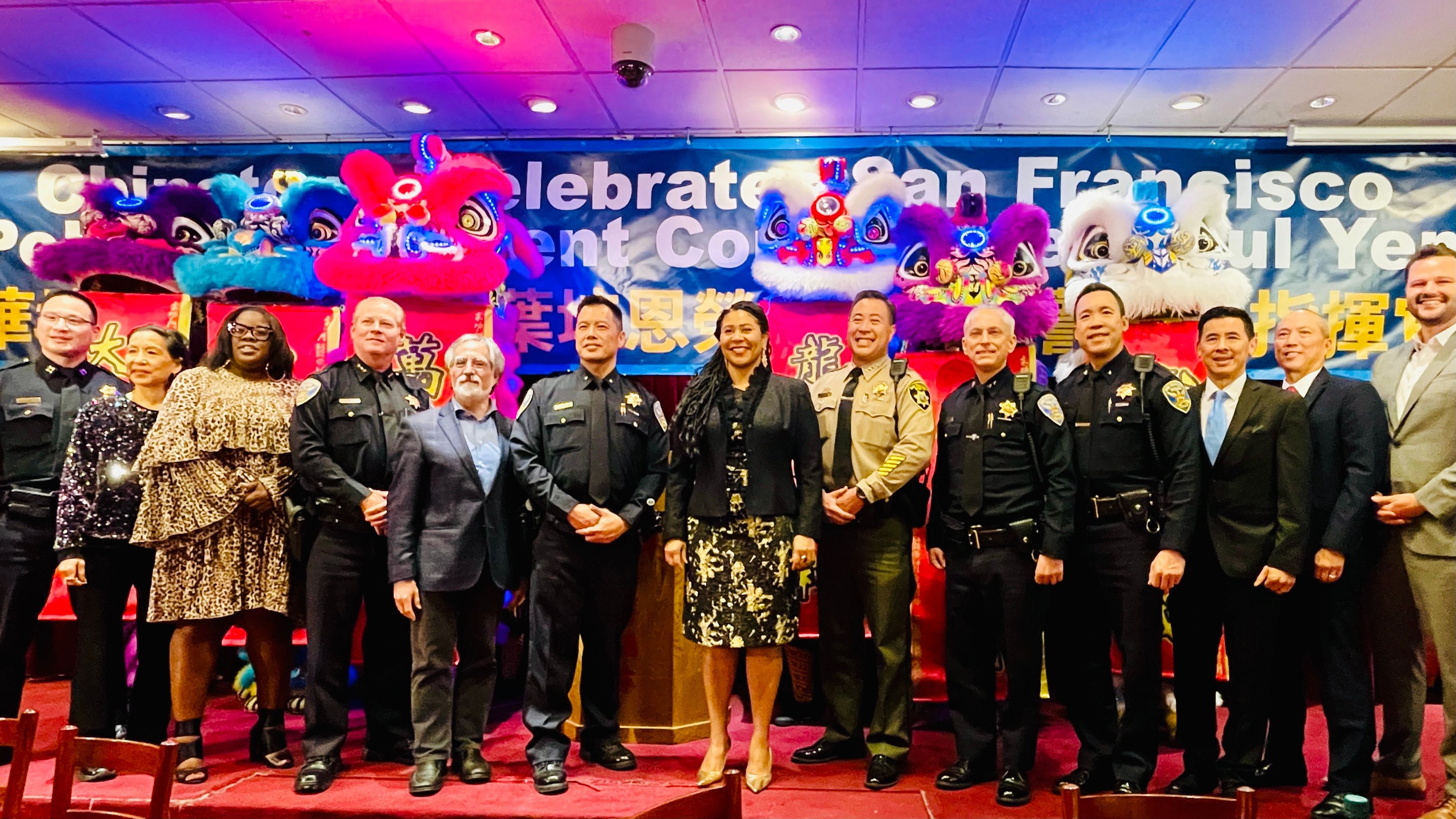 A celebration party was held in Chinatown to congratulate new Police Commander Paul Yep (fifth from far left). Photo by Portia Li