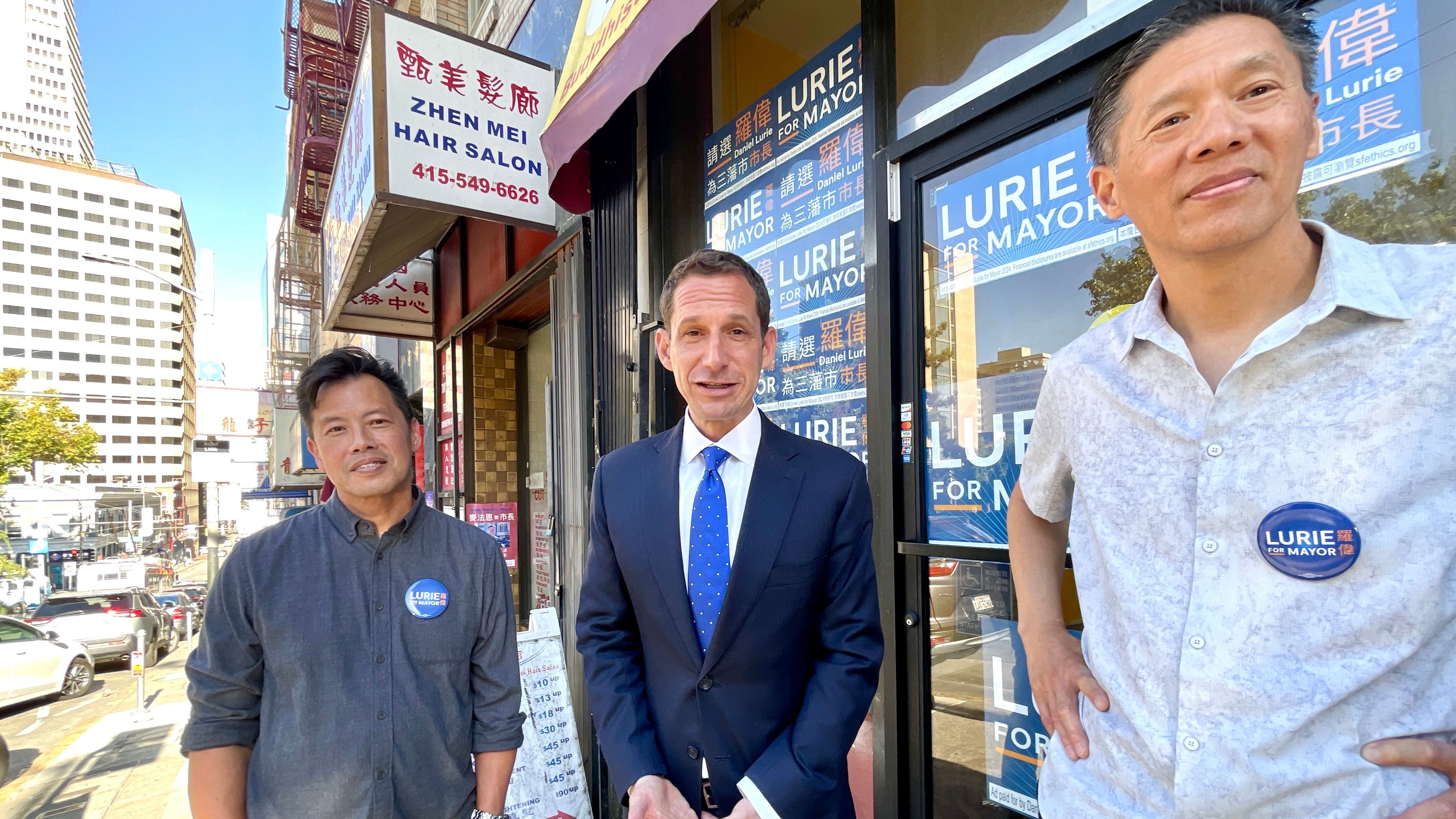 Both retired SFPD Commander Paul Yep (left) and Captain Robert Yick were born in Chinatown. They are excited to see mayoral candidate Daniel Lurie (center) open a campaign office in Chinatown to reach out to more Asian voters. Photo by Portia Li