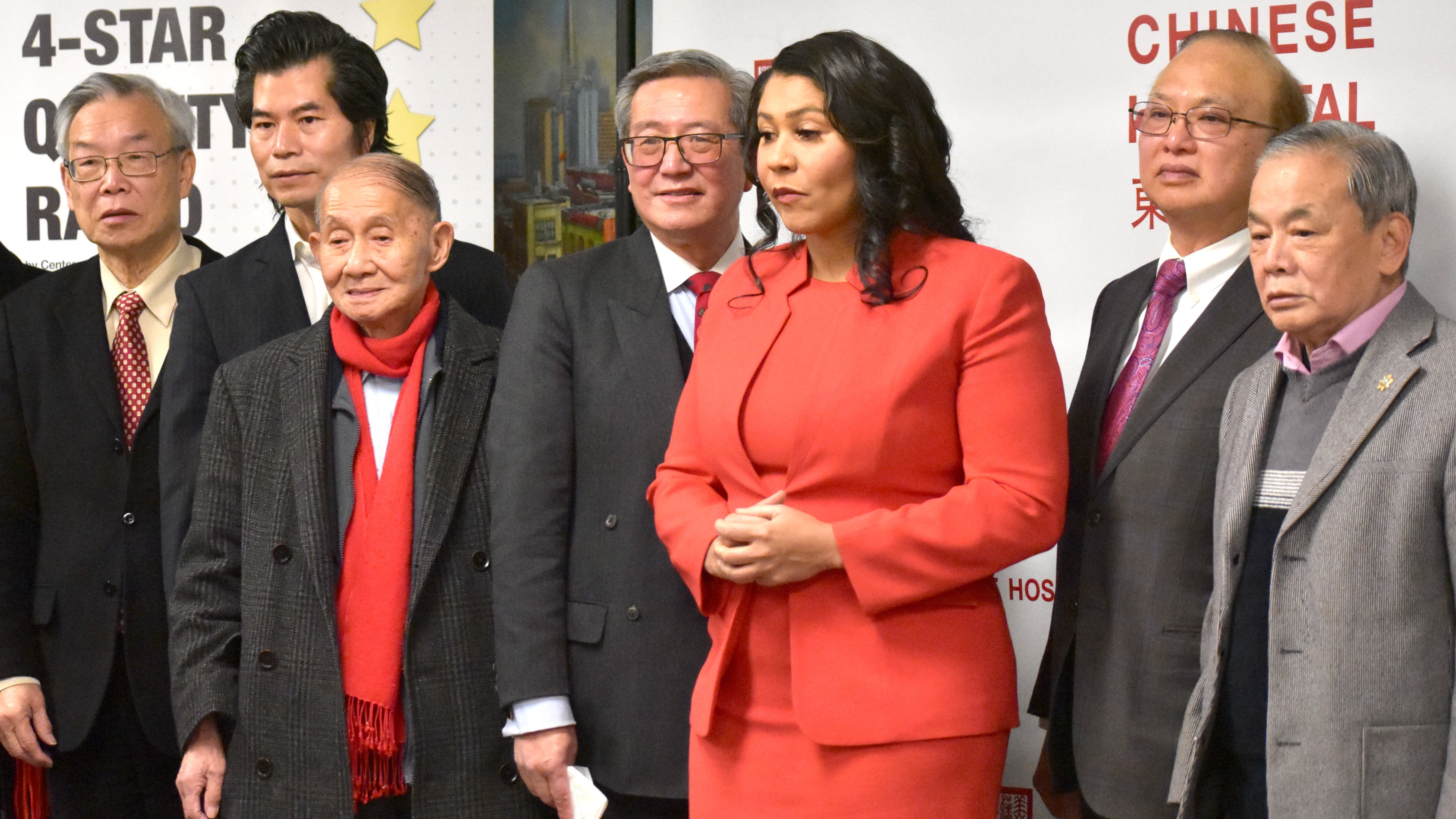 Mayor London Breed congratulates the new Board Members of the Chinese Hospital Board of Trustees, including Ding Lee (from left), Donald Luu, Thomas Ng, Harvey Louie, Kin Yee and Charles Chow. Photo by Portia Li