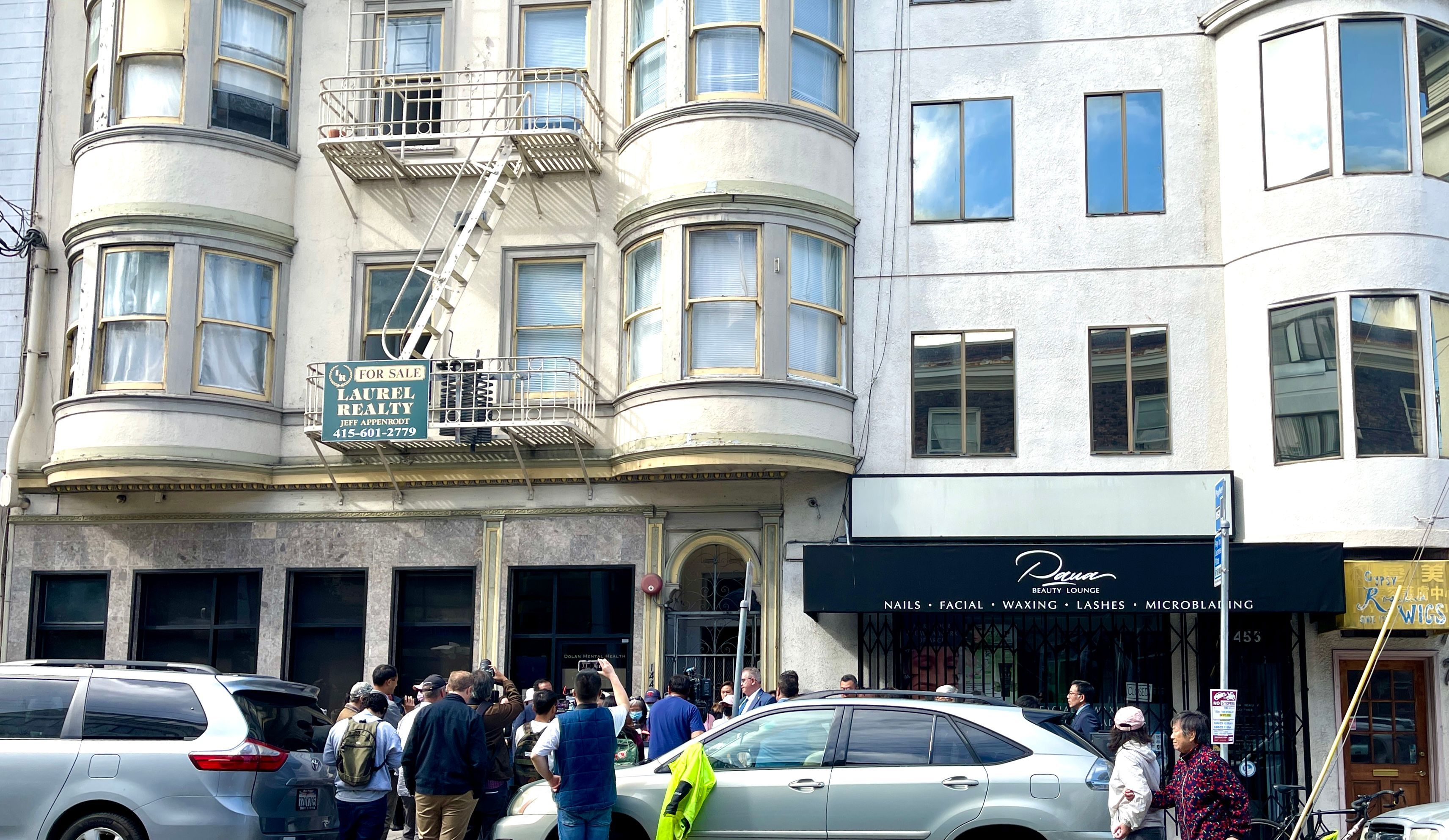 City officials and SRO tenants attend the press conference in front of 1443-1449 Powell Street apartment building whose owner is one of the defendants sued by City Attorney David Chiu. Photo by Portia Li