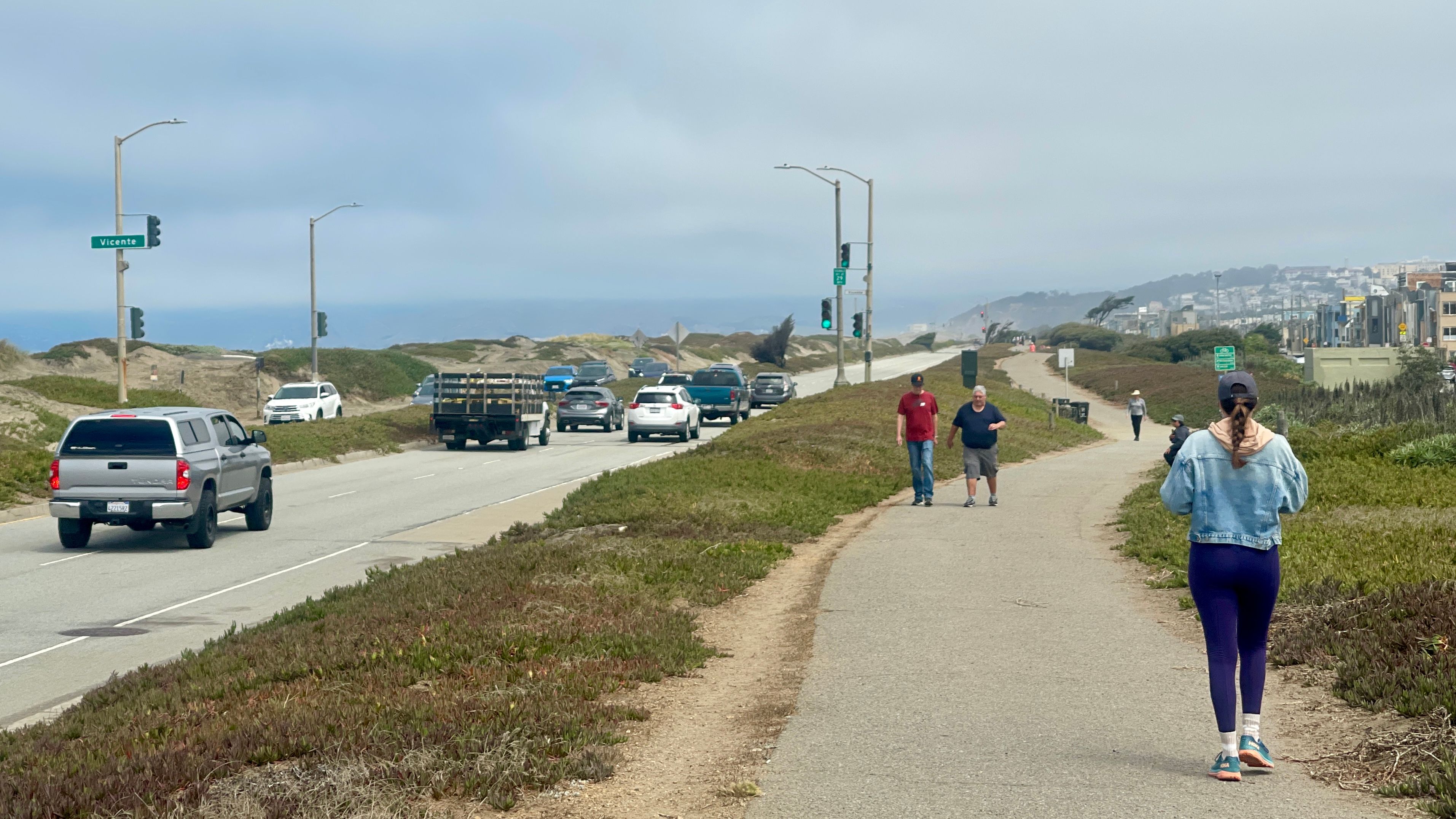 Currently the Great Highway is open for vehicles on weekdays only, while people enjoy the long walkway as a recreational area. Photo by Portia Li