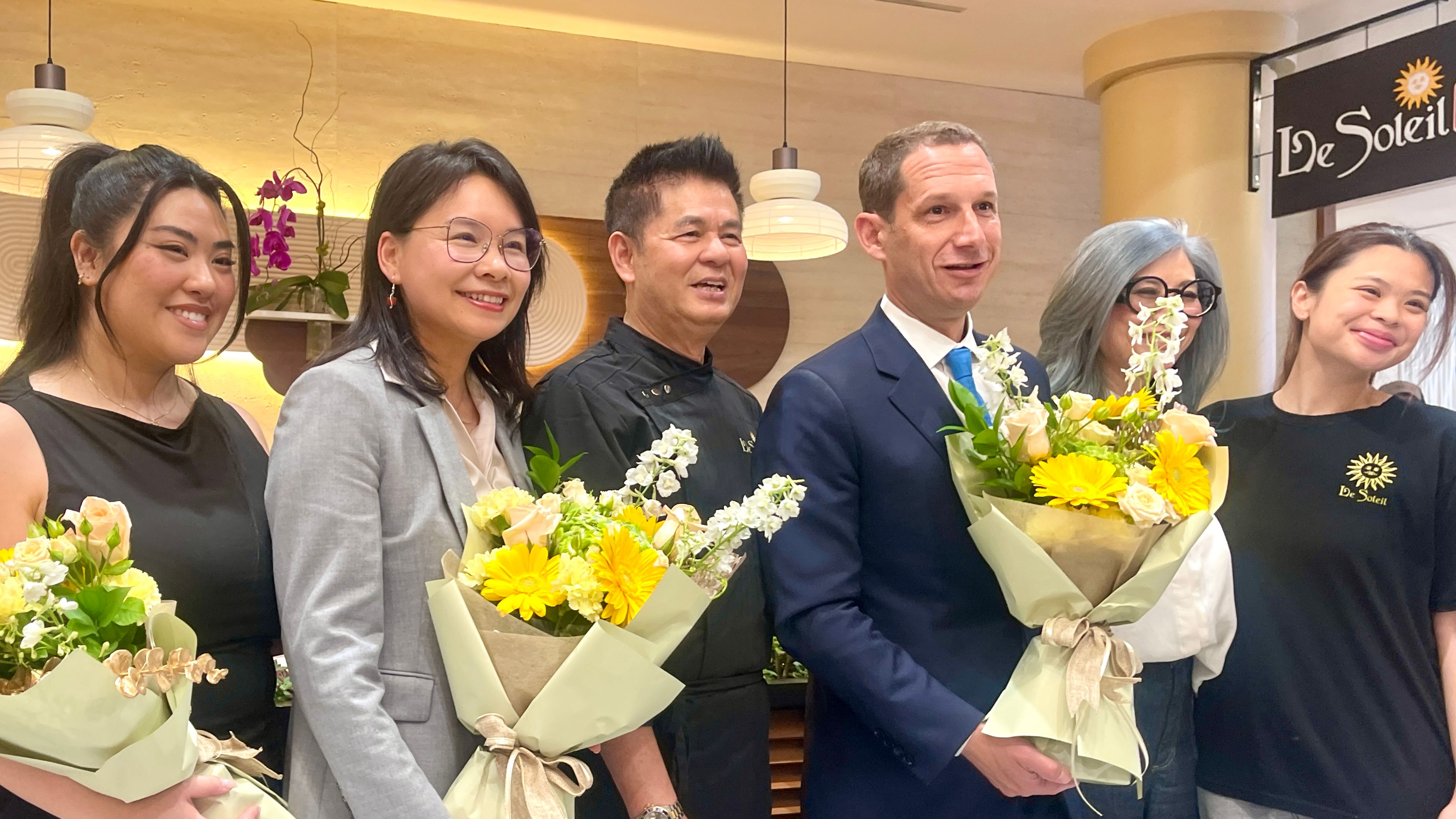 Mayor Daniel Lurie (3rd from far right) signed a number of ordinances from his PermitSF legislative package in July to help small business and property owners secure the permits they need more easily and efficiently. Some of the ordinances take effect on August 16, 2025. 