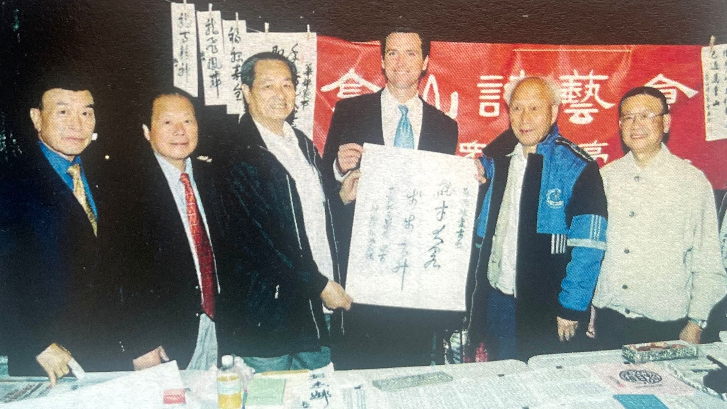 Chinese calligraphers presented calligraphy works to Mayor Gavin Newsom who visited Chinatown night market.