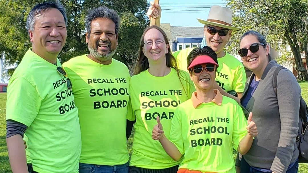 Autumn Looijen and Siva Raj (third and second from left) authored the recall school board petitions and measures in 2021. Ann Hsu (third from right) and Kit Lam (first from left) were volunteers of the recall movement. Courtesy photo