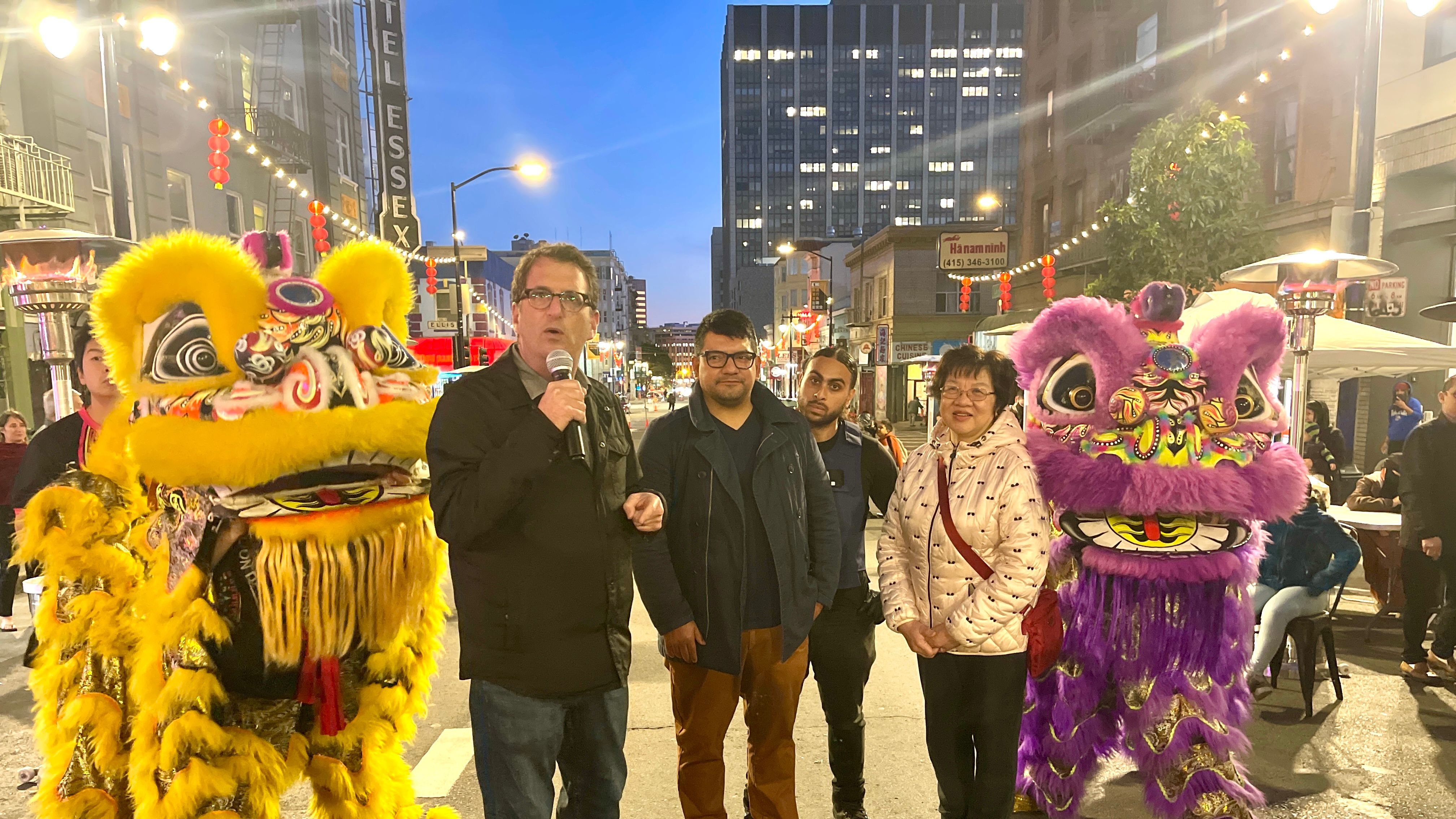 Supervisor Dean Preston (from left), Tenderloin Merchants Association President Aref Egalli, Community Ambassador, and BeChinatown founder Lily Lo joins the lighting ceremony at Little Saigon in Tenderloin. Photo by Portia Li