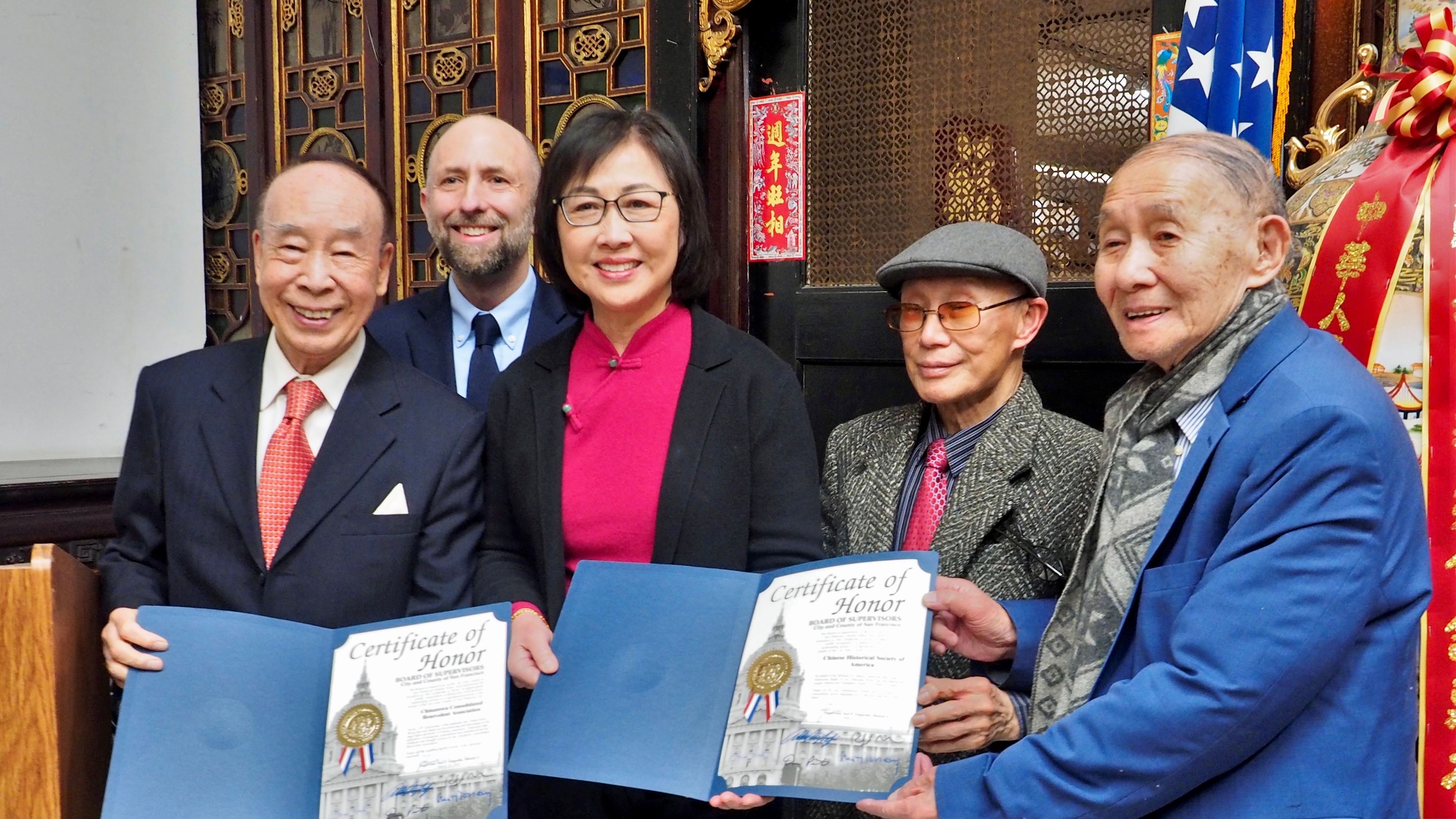 Supervisor Joel Engardio (second from left) presents certificates of honor to leaders of the Chinese Consolidated Benevolent Association at the celebration of 125th anniversary of the Wong Kim Ark’s victory on birthright citizenship. Photo by Ben Kwan