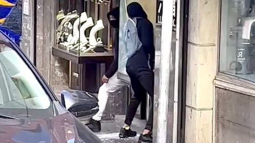 The surveillance video images provided by the witnesses indicate that two suspects smashed the windows of Luk Fook Jewellery and robbed some jewelries. Courtesy photo.