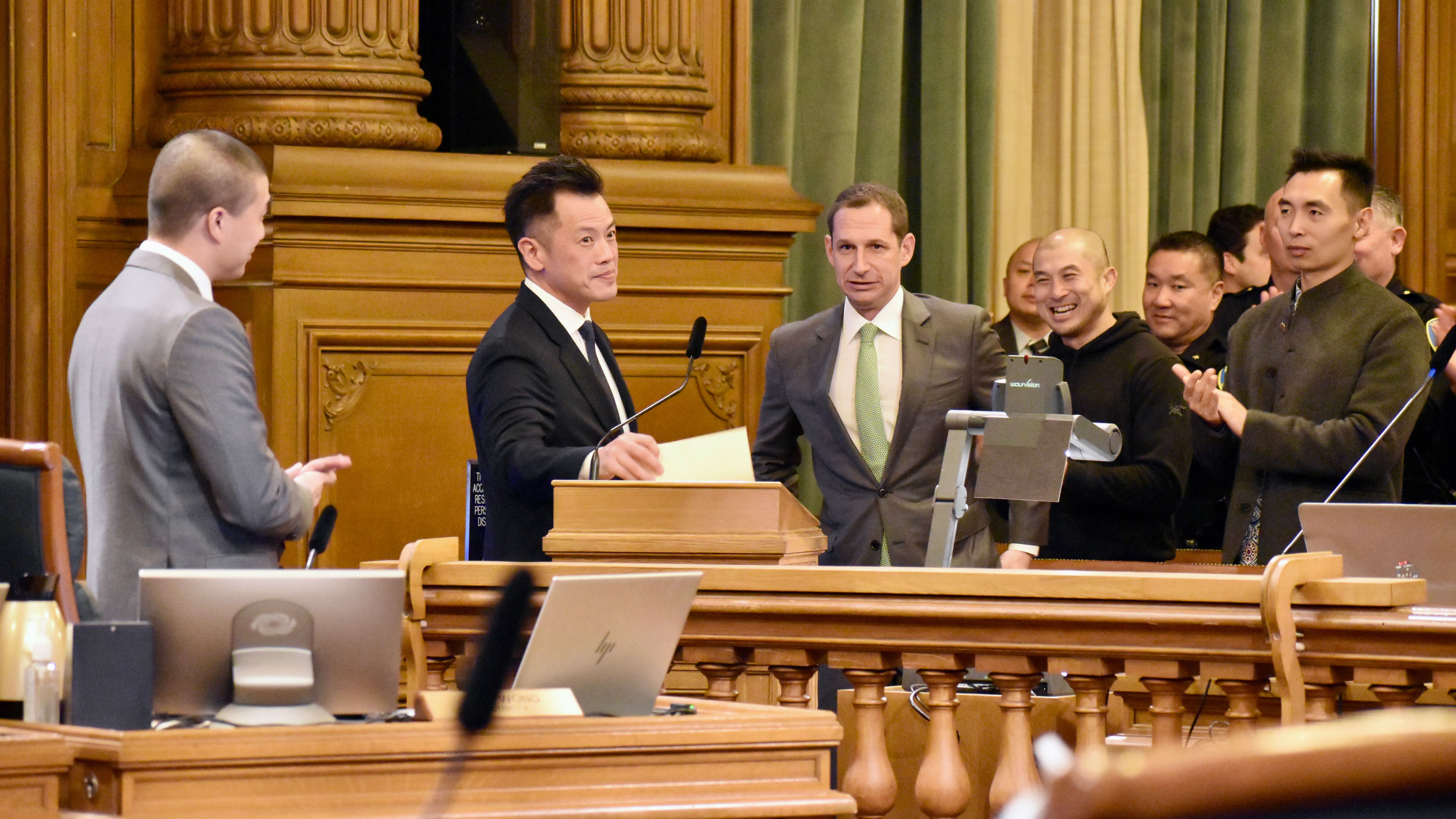 Mayor Daniel Lurie (center) attends the commendation ceremony at the Board of Supervisors meeting in honoring outgoing Interim Police Chief Paul Yep’s (second from far left) excellence in serving the City. Photo by Portia Li