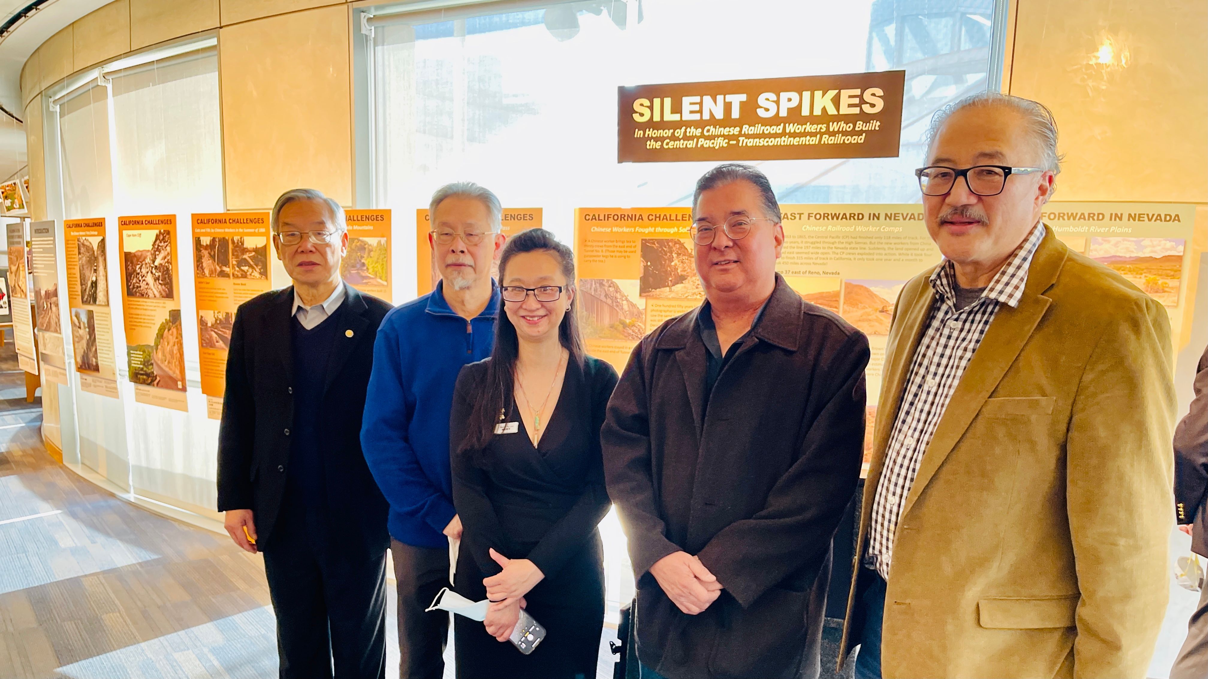 Chinatown leaders, Ding Lee ( from far left), Dennis Law, Nancy Yu Law, Steven Lee and Larry Yee, attended the opening ceremony of the exhibition in the Main Library. Photo by Portia Li