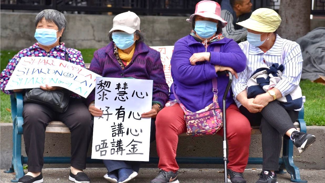 A group of Chinese seniors hold signs at Portsmouth Square to support Sharon Lai’s run for D3 Supervisor in 2024. Photo by Portia Li