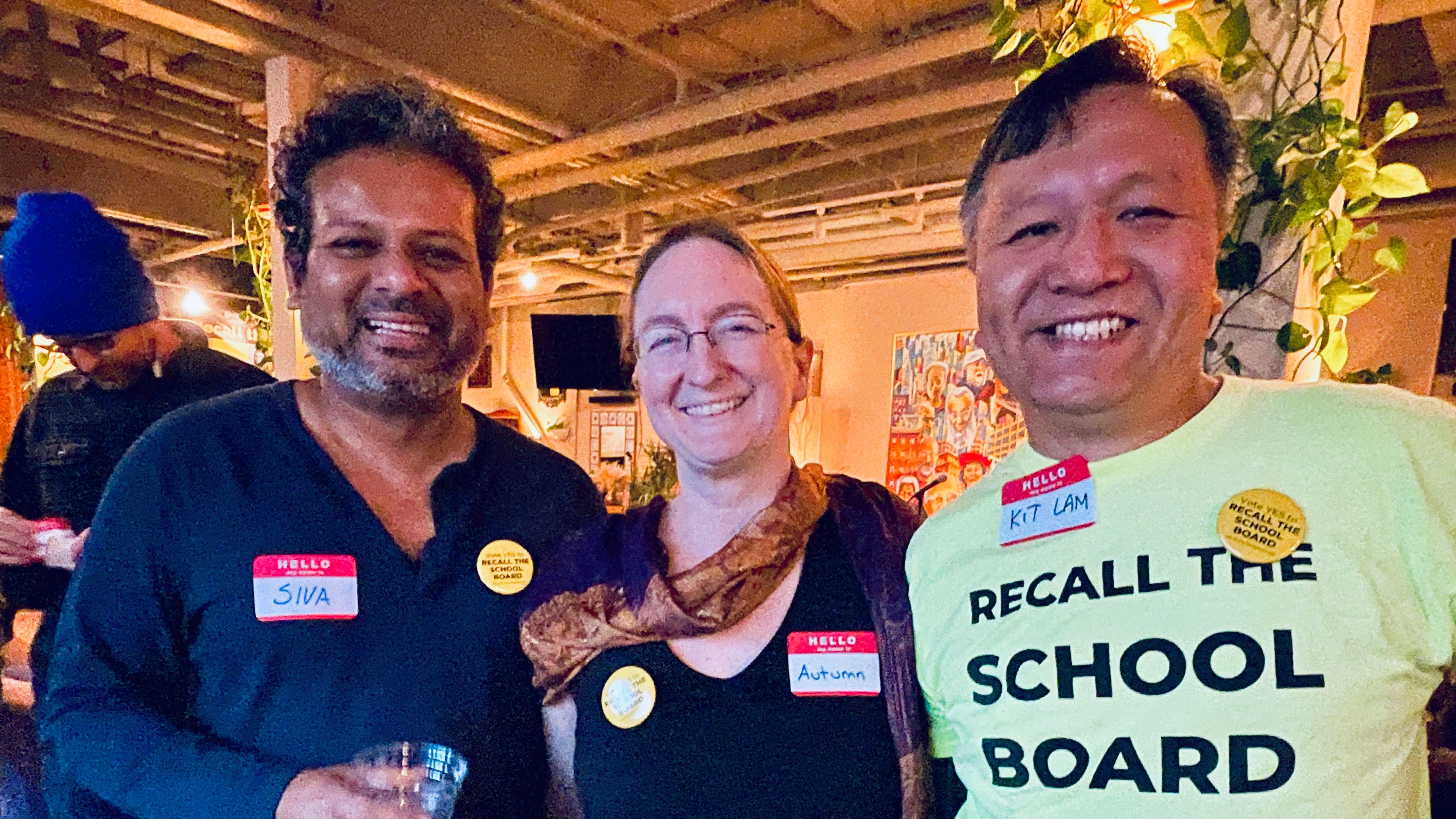 Parent volunteer Man Kit Lam (from right) and two organizers of the Recall School Board Campaign, Autumn Looijen and Siva Raj, were at the kickoff party. Photo by Portia Li