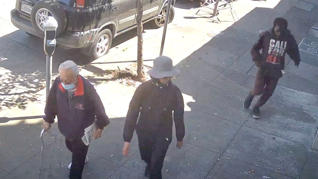 Video shows that the suspect (right) turns around to follow the Chinese woman victim (center) from behind before she is attacked. Courtesy photo