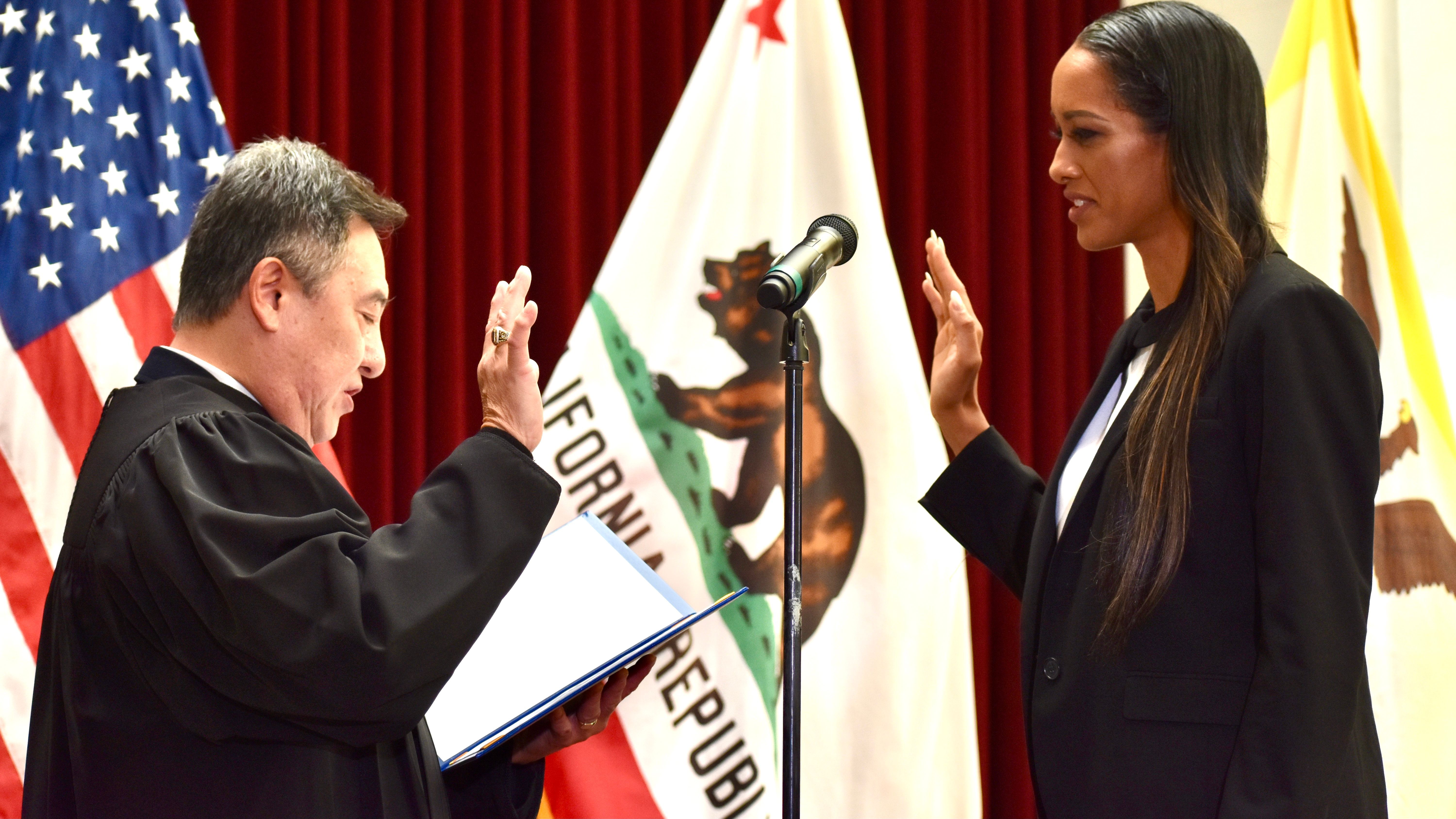 Brooke Jenkins is sworn in as District Attorney by SF  Superior Court Presiding Judge Samuel Feng. Photo by Portia Li