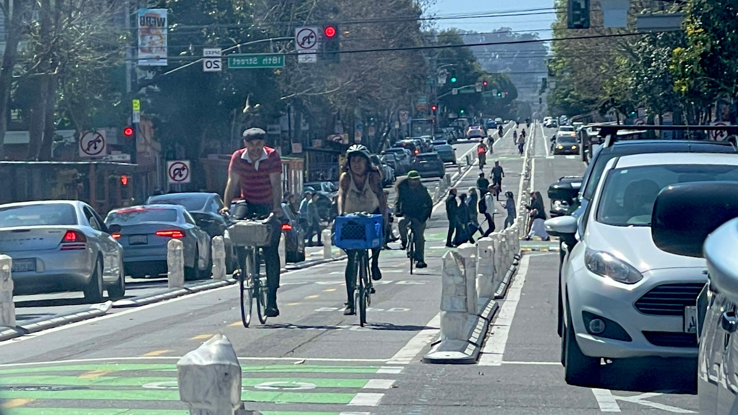 SFMTA introduced an addition of a central bike lane to Valencia Street’s business corridor in the Mission District that has led to business closures and merchants’ protests. Photo by Wind Newspaper