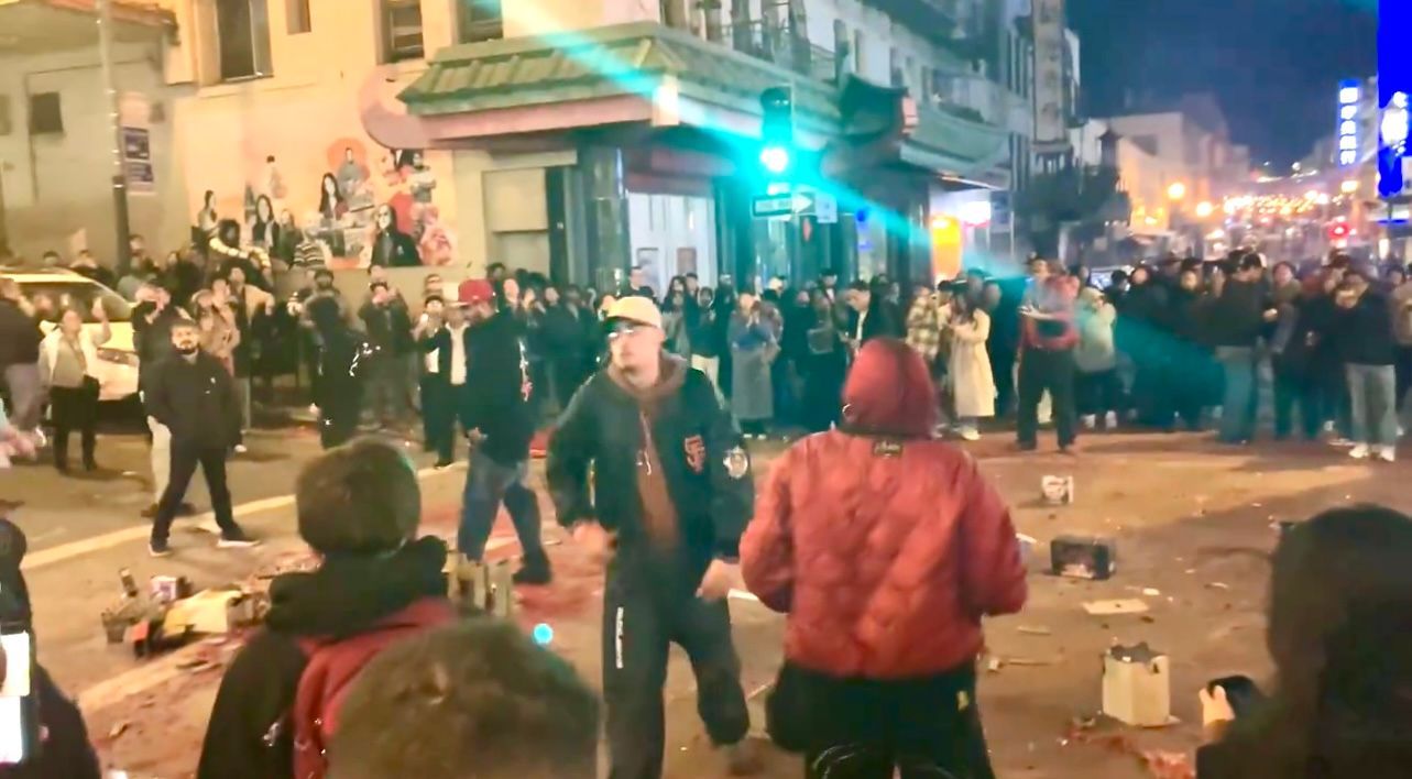 Prior to the Waymo vehicle being set on fire on Lunar New Year night, a large crowd gather at the intersection of Grant and Jackson Streets causing disturbance. Screenshot FriscoLive415 on X