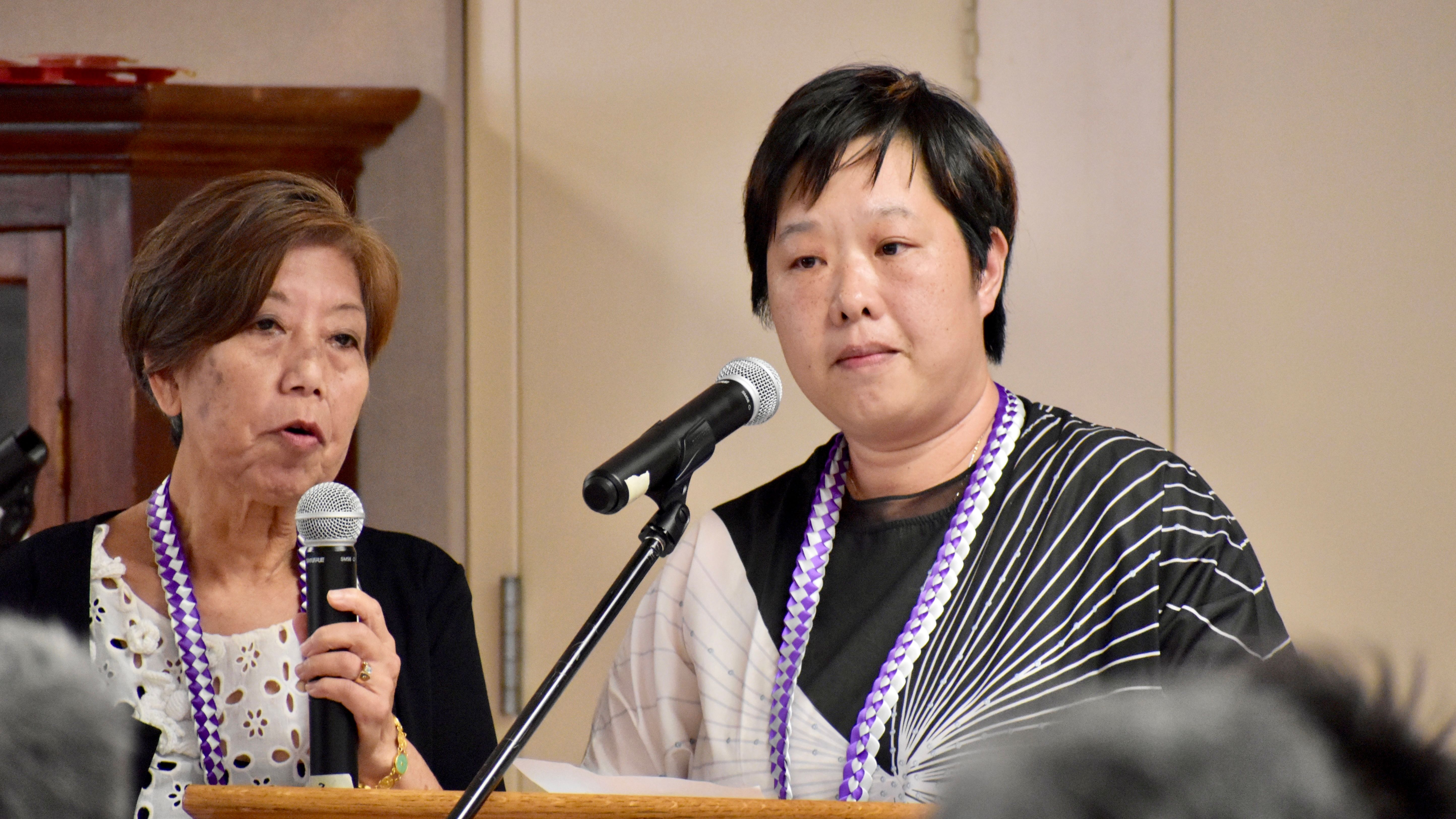 Mill Lei, right, owner of an Asian food market in San Francisco Chinatown, speaks at the U.S. Department of Agriculture meeting in Chinatown. Yvonne Lee, Commissioner of the U.S. Department of Agriculture, translates for Lei.  Photo by Portia Li