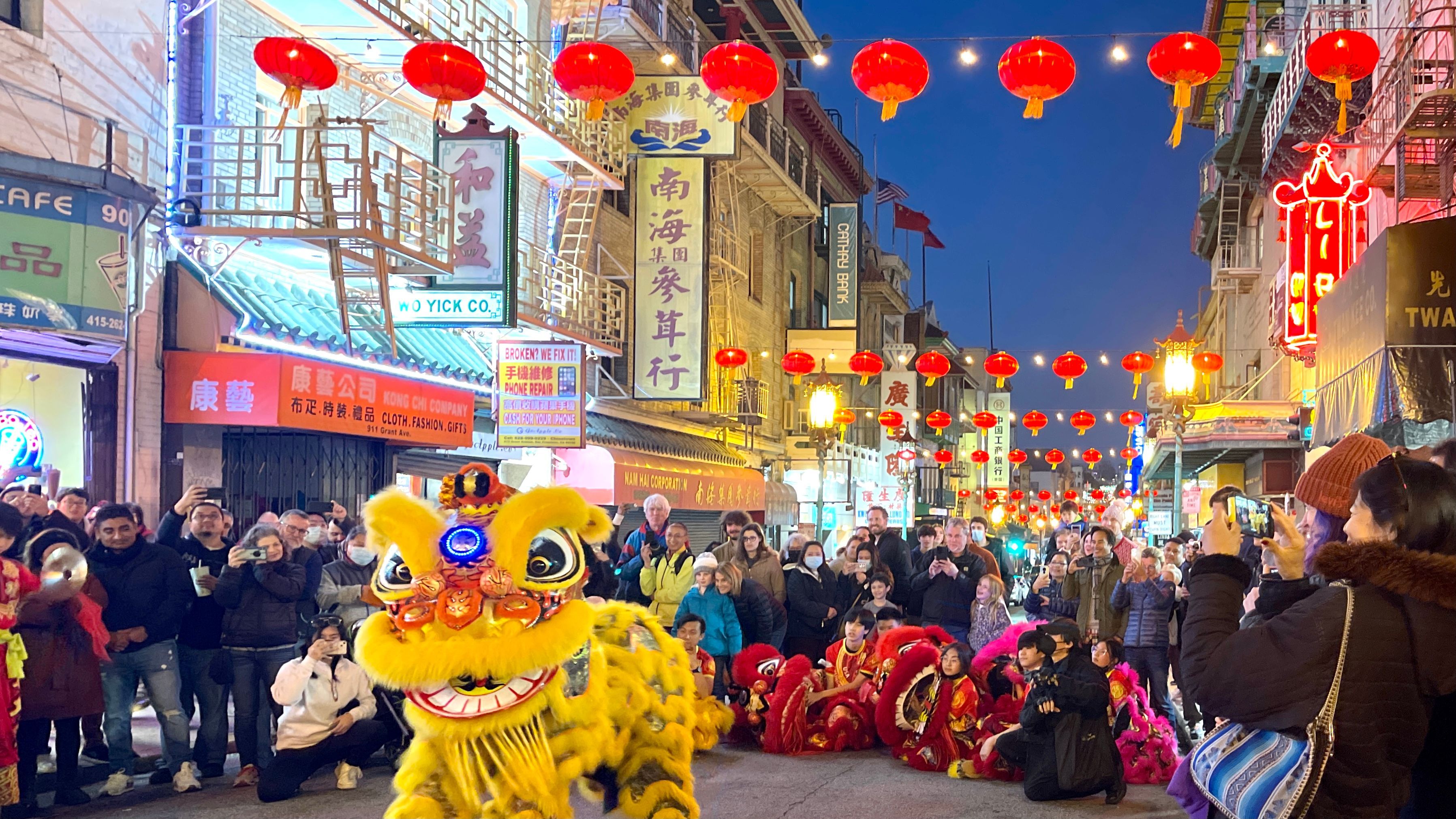 Community members and tourists are so excited to see more new red lanterns on Grant Avenue and join the lighting ceremony on December 23, 2022. Photo by Portia Li