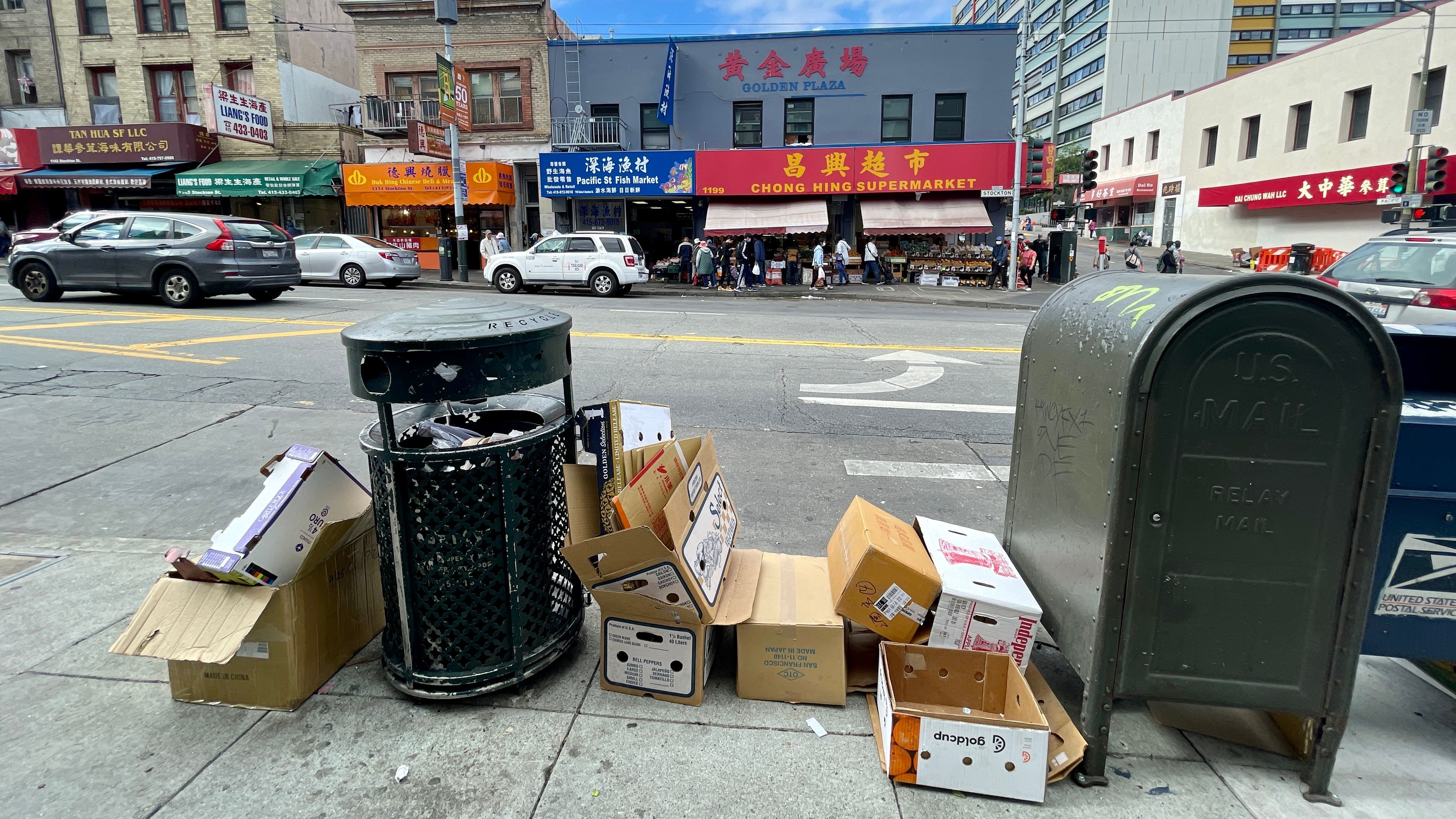 Empty cardboard boxes are seen on the sidewalks in Chinatown. Merchants located around the spots are charged by Recology with huge fines. Photo by Portia Li