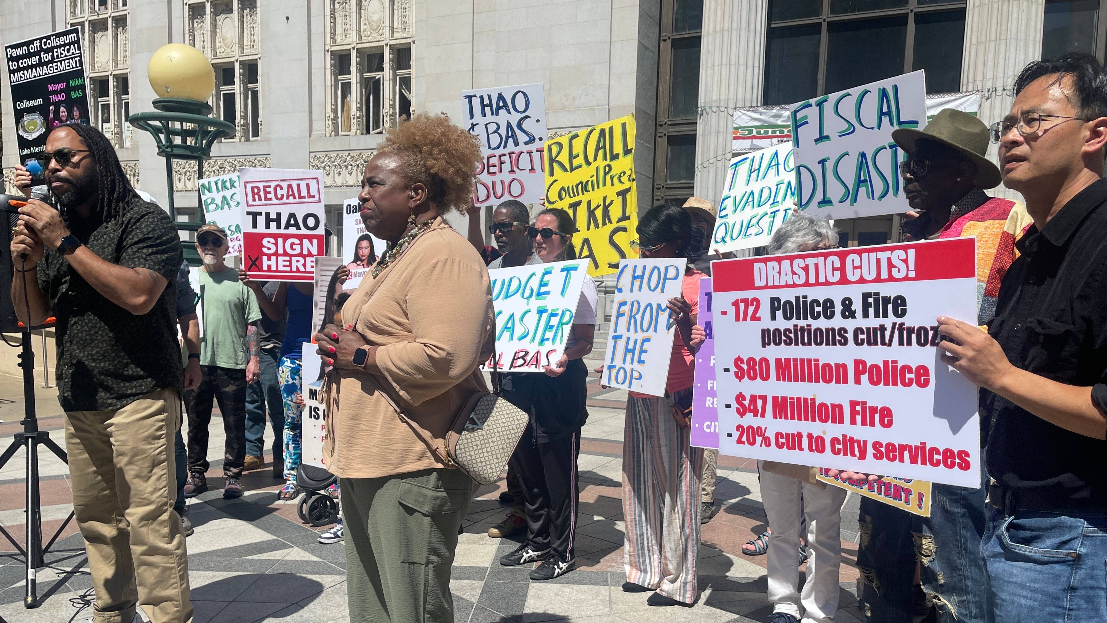 Supporters of recall Thao campaign holds a rally in front of Oakland City Hall when Mayor Shen Thao speaks to the news media inside City Hall on June 24. Photo by Portia Li