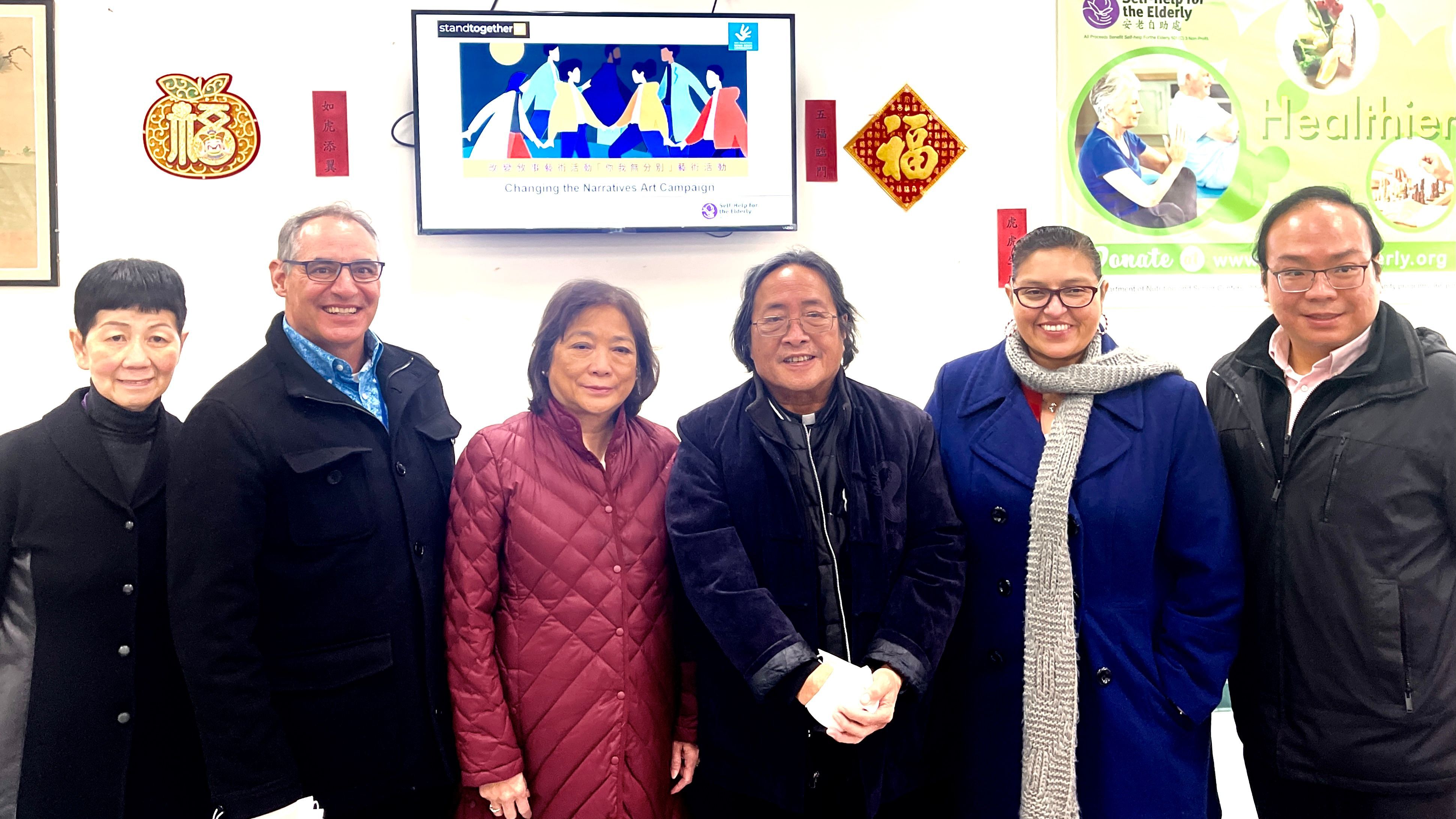 San Francisco Human Rights Commissioner Irene Yee Reily (third from left) and Chinese community leaders announce the art campaign and competition to promote African and Asian communities’ solidarity. Photo by Portia Li