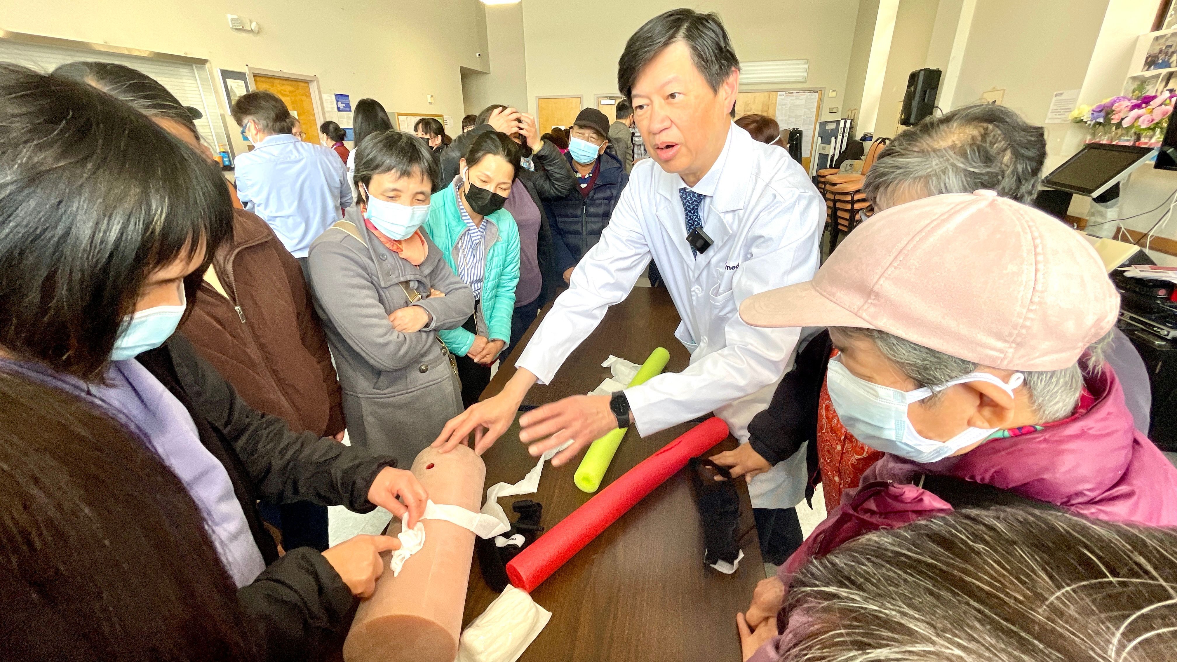 Dr. Edmund Tsoi advises that any medical gauze bandage which can be easily found in any stores can be put into the wounds of the victims to stop the bleeding. Photo by Portia Li