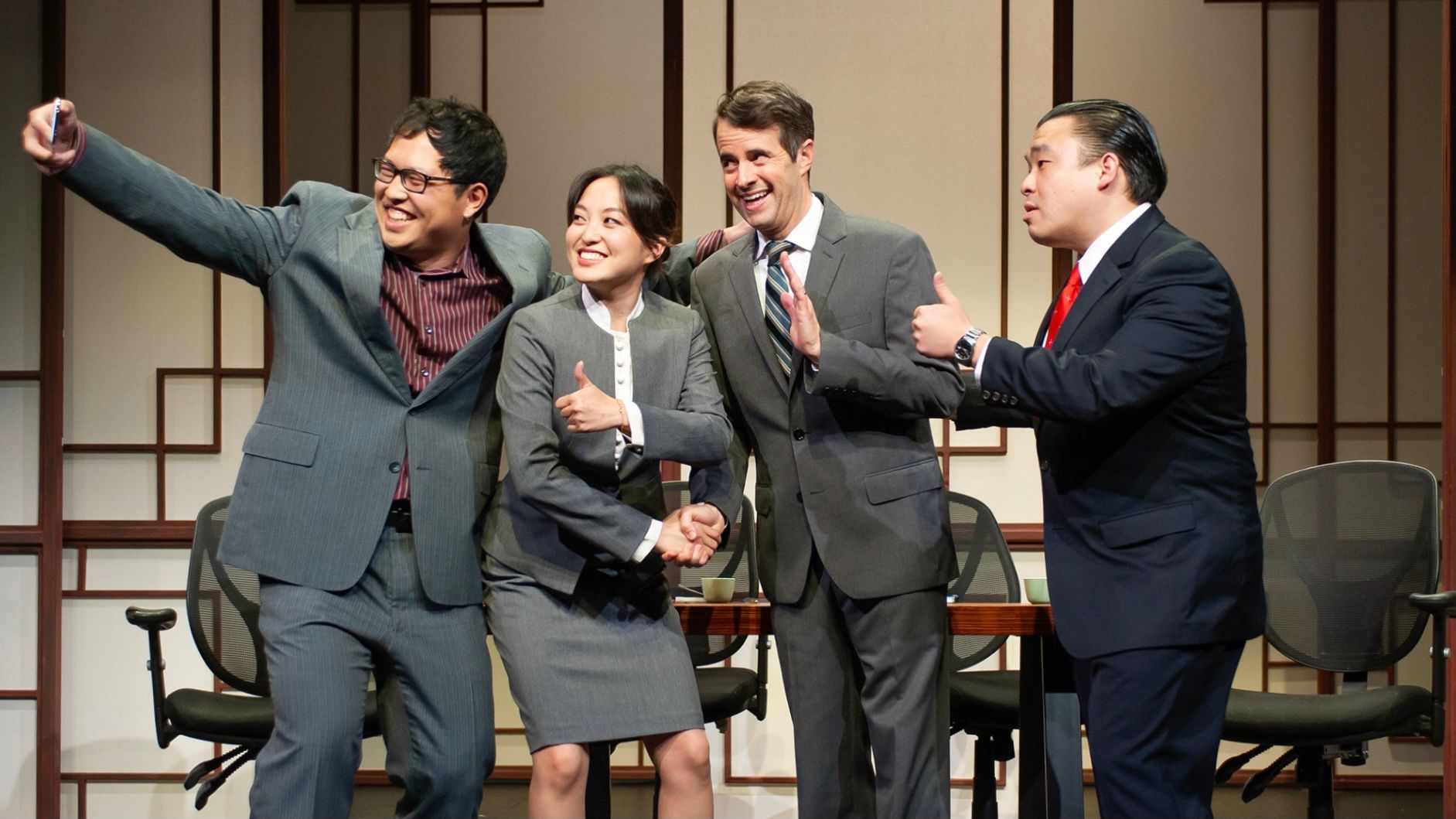 Translator Zhao (from left, Xun Zhang), prosecutor Li (Sharon Shao), American sign maker Daniel Cavanaugh (Michael Barrett Austin), and Judge Xu Geming (Phil Wong) take a selfie in the comedy Chinglish. Photo: Jessica Palopoli