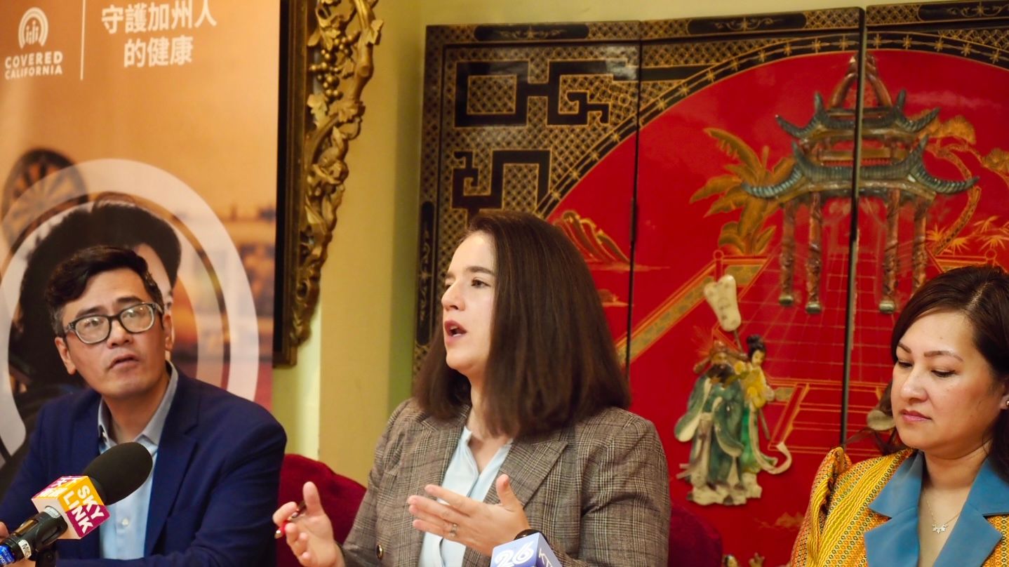 Jessica Altman (center), Executive Director of Covered California, visits San Francisco Chinatown and encourages members of the Chinese community to sign up for 2026 health insurance plans during the annual open enrollment which begins on November 1 and ends on January 31, 2026. Photo by Ben Kwan