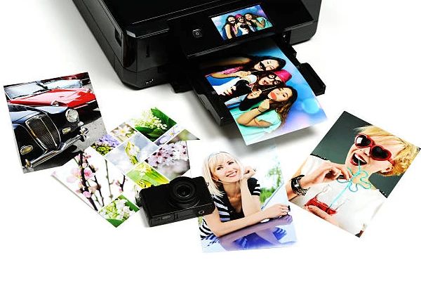 Fotos 10x15 sendo impressas