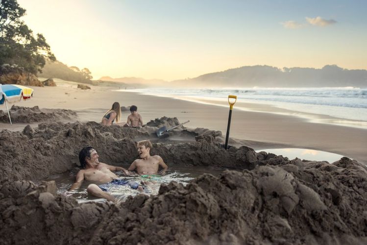 A group playing at the beach