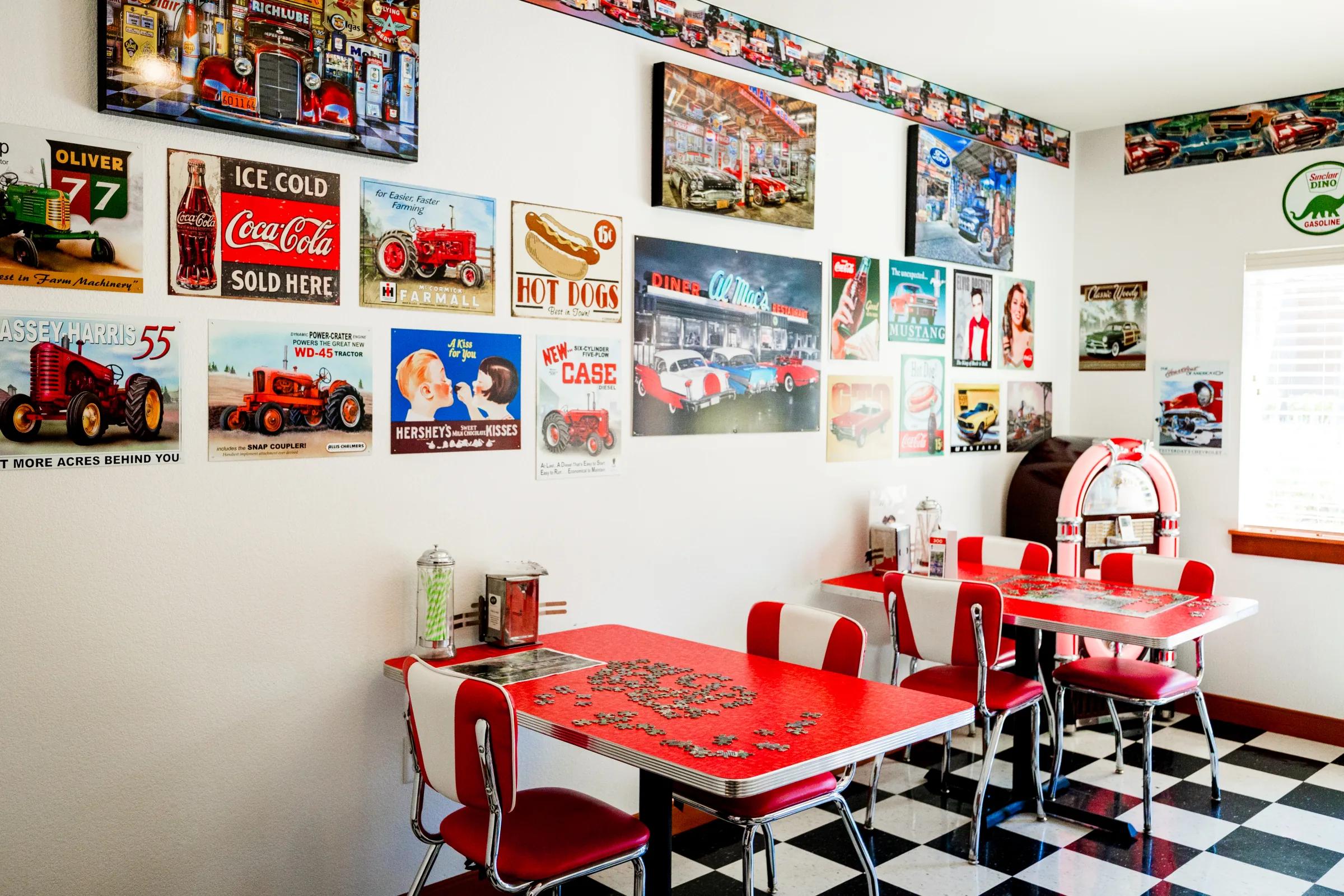 Gardens on Quail 1950s soda shop with vintage signs, red tables, and jukebox
