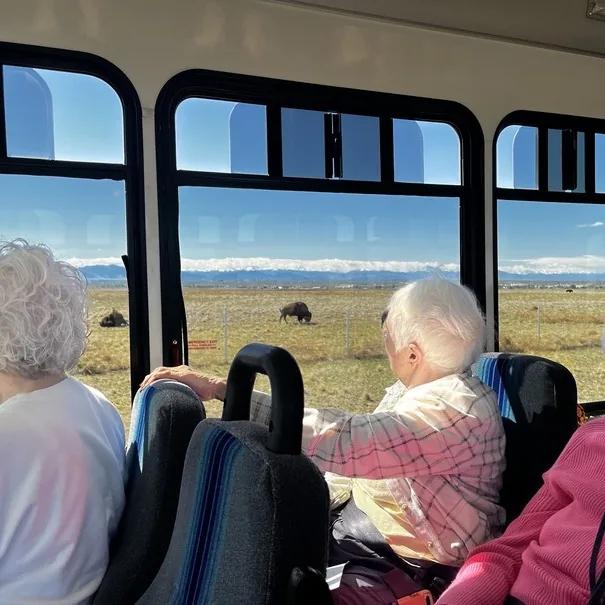 Gardens on Quail residents viewing wildlife and mountain scenery from a shuttle outing