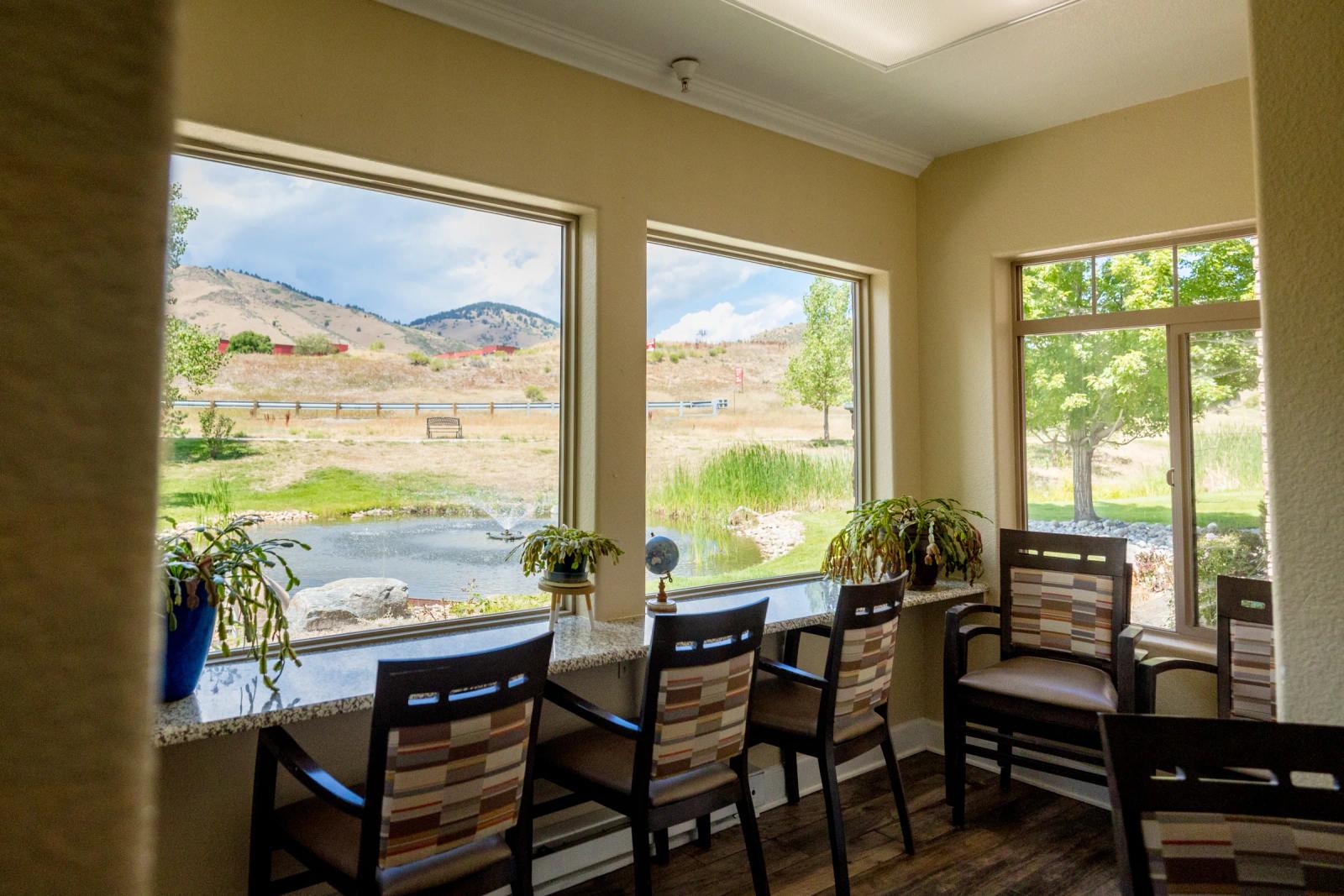 Golden Pond dining counter seating overlooking the pond and foothills