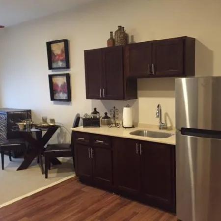Kitchenette in an assisted living apartment at Stonebridge Senior