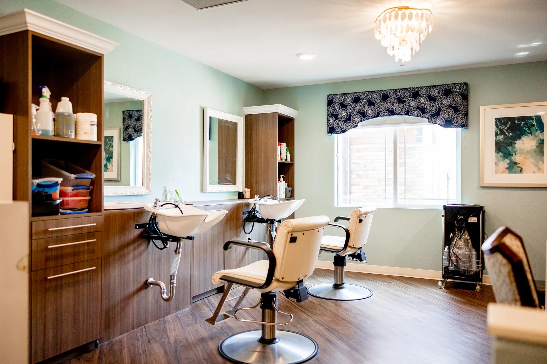 Stonebridge Senior salon with styling chairs, wash basins, and mirrors