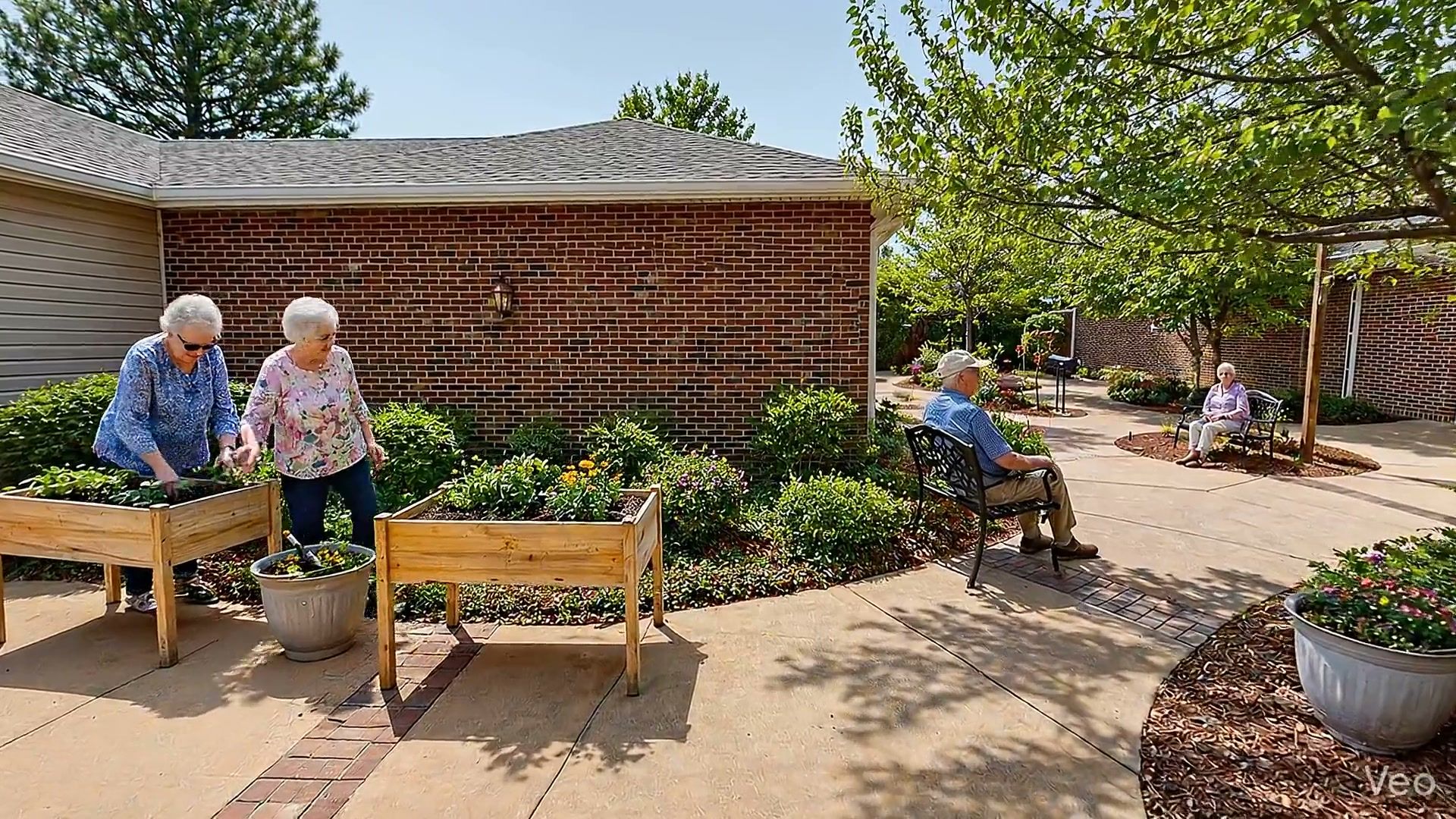 Bear Creek residents gardening together outdoors