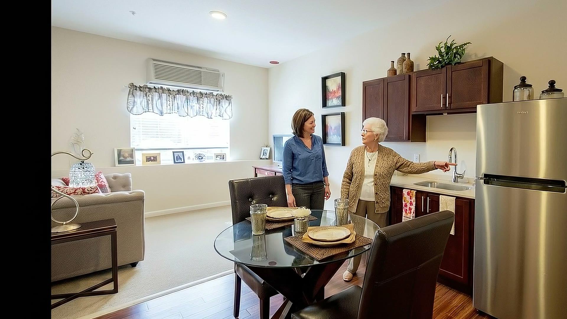 Stonebridge apartment living area with kitchen and dining space