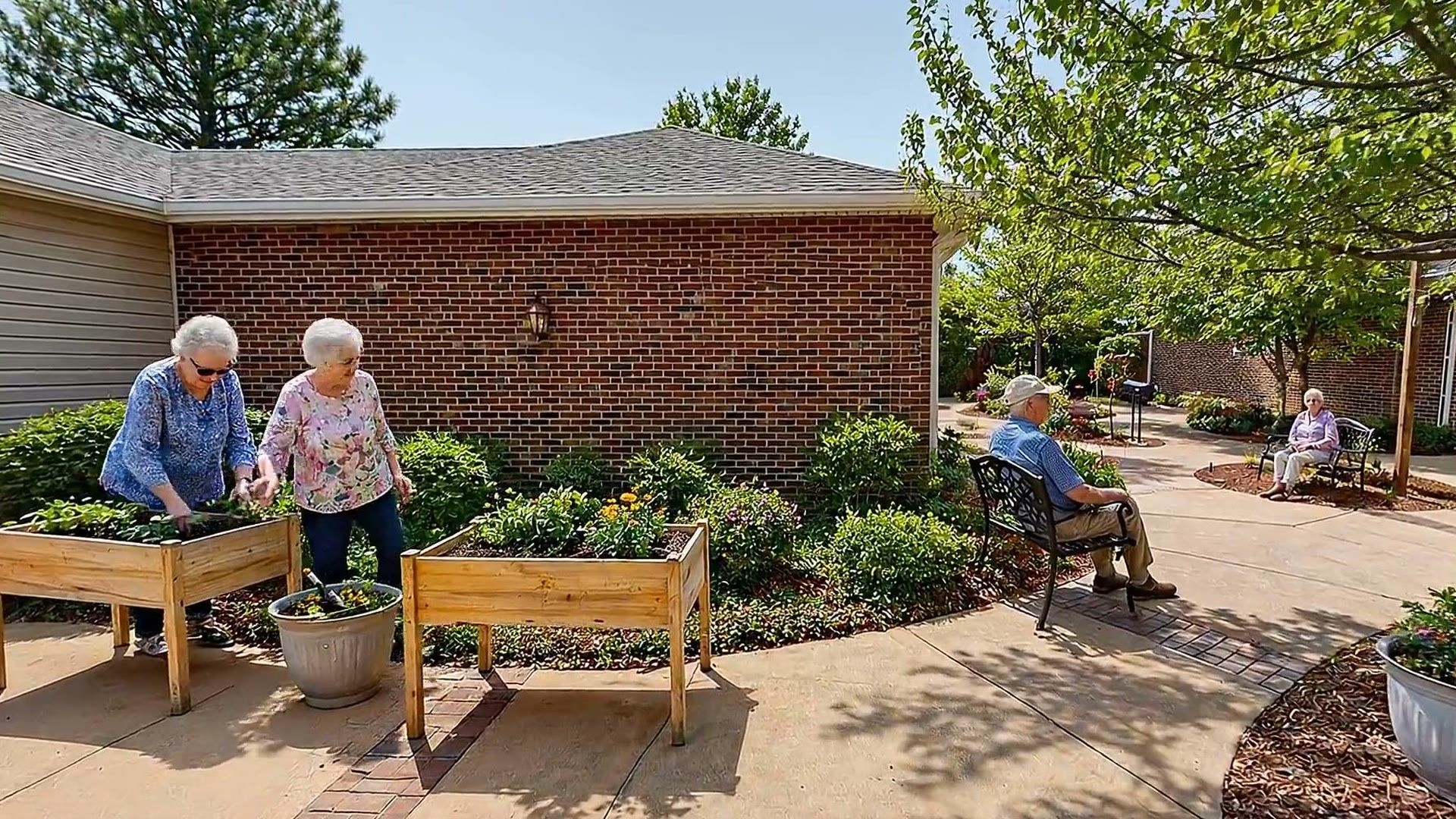 Bear Creek residents gardening together outdoors