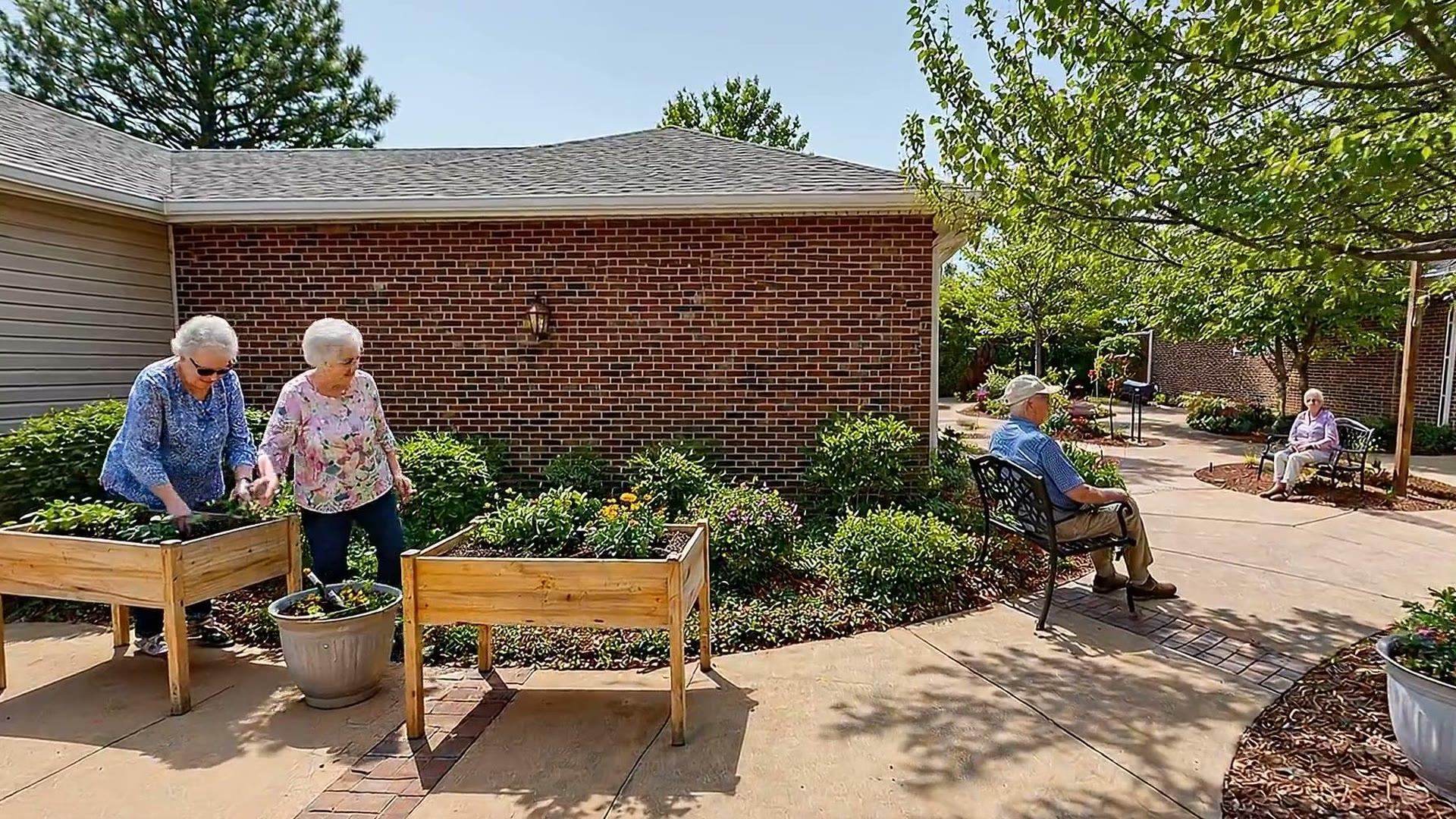 Bear Creek residents gardening together outdoors