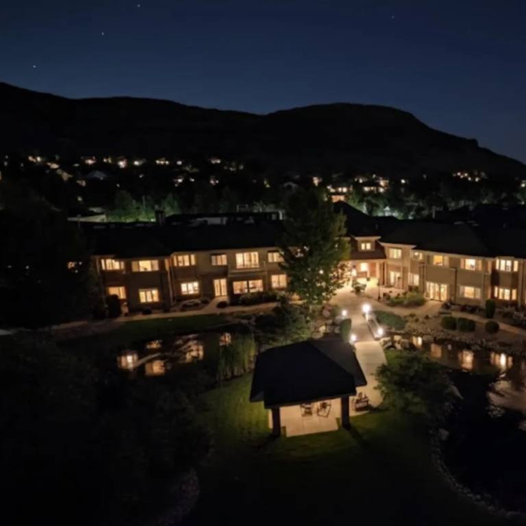 Golden Pond community buildings and gazebo illuminated at night