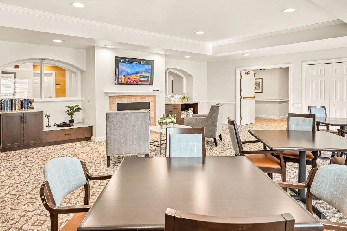 Lakewood assisted living great room at Bear Creek with social seating and daily activities.