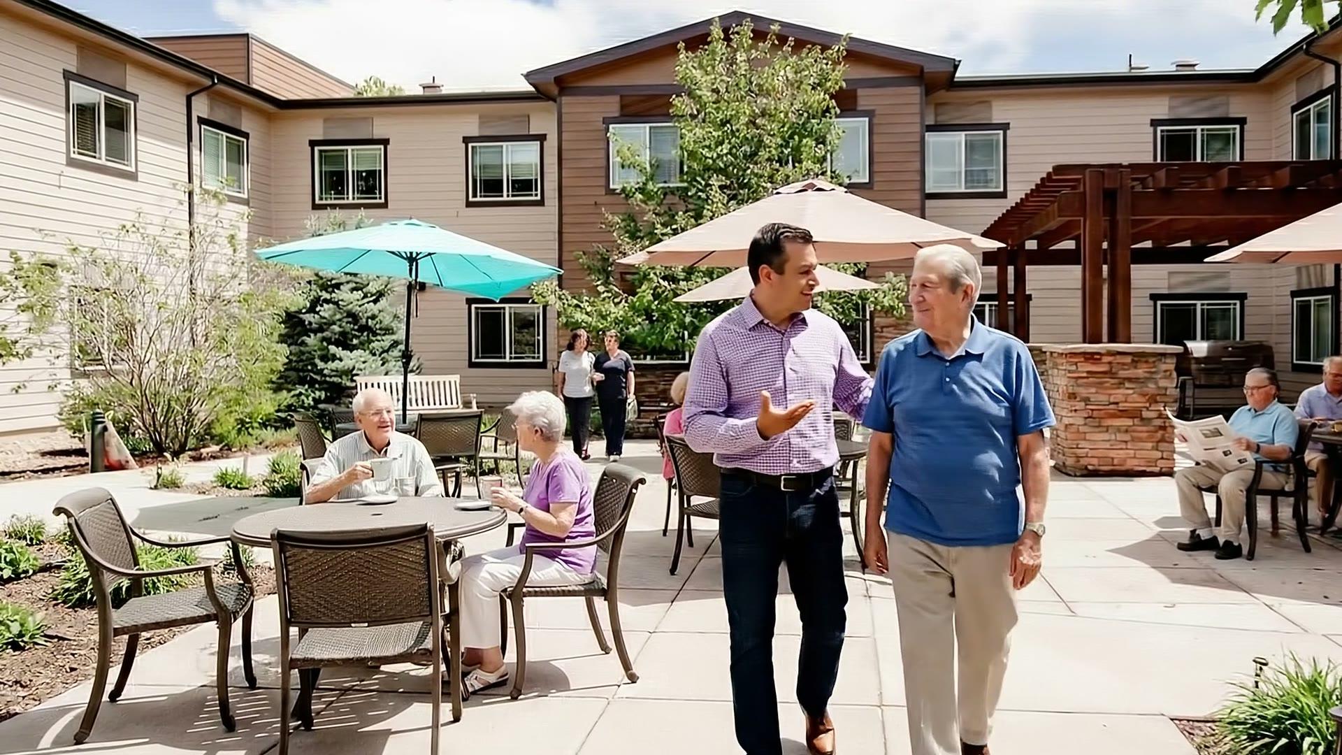 Stonebridge residents and team member walking through the courtyard