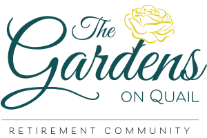 Logo for The Gardens on Quail Retirement Community featuring a yellow rose.