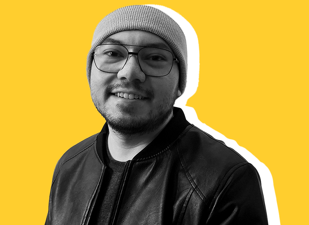 Andrés Ramirez staff photo with yellow background