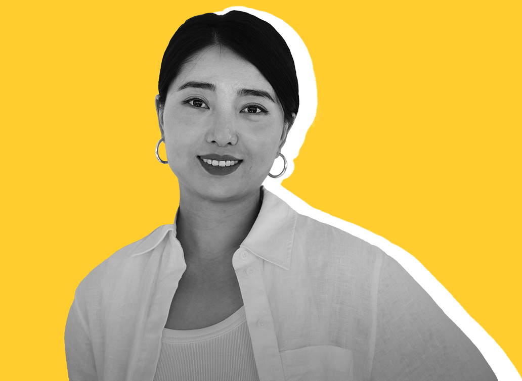 Yimeng Sun staff photo with yellow background