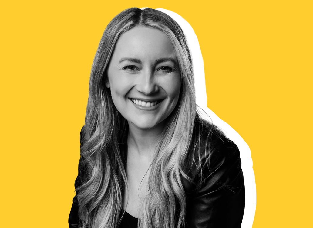 Jessica Luch staff photo with yellow background 