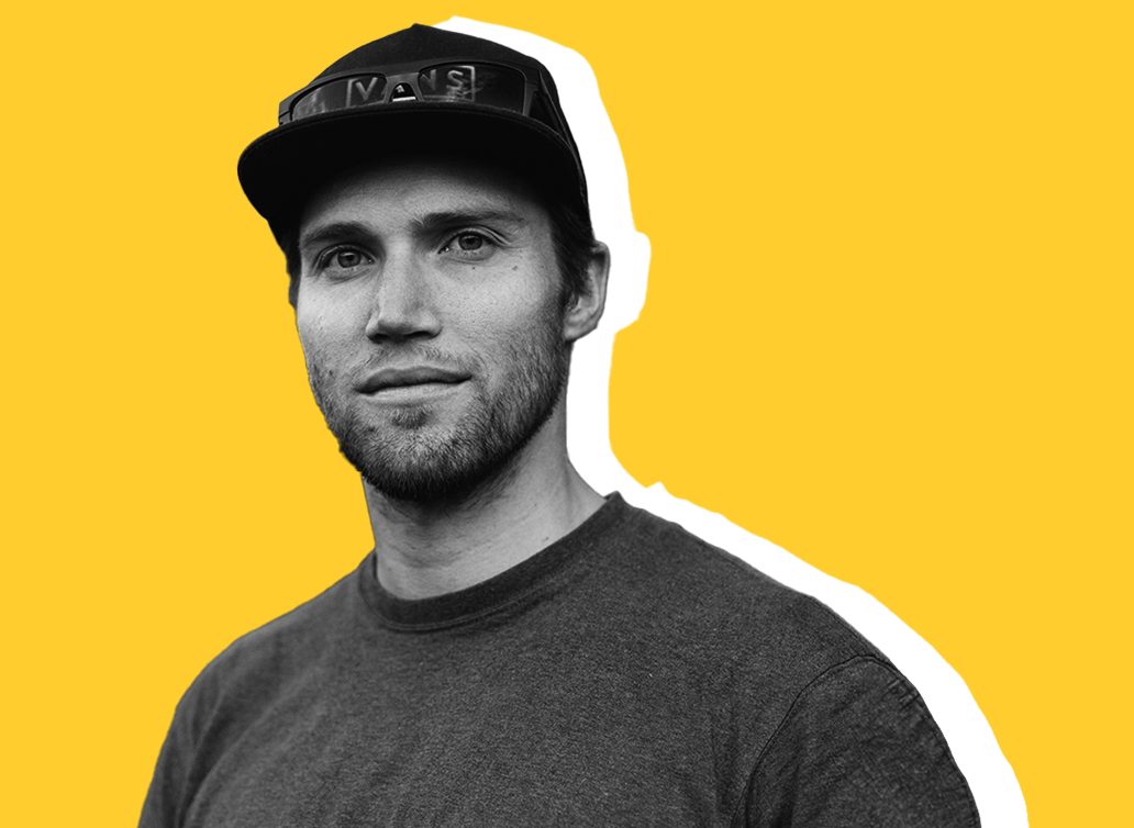 Tyson Rider staff photo with yellow background