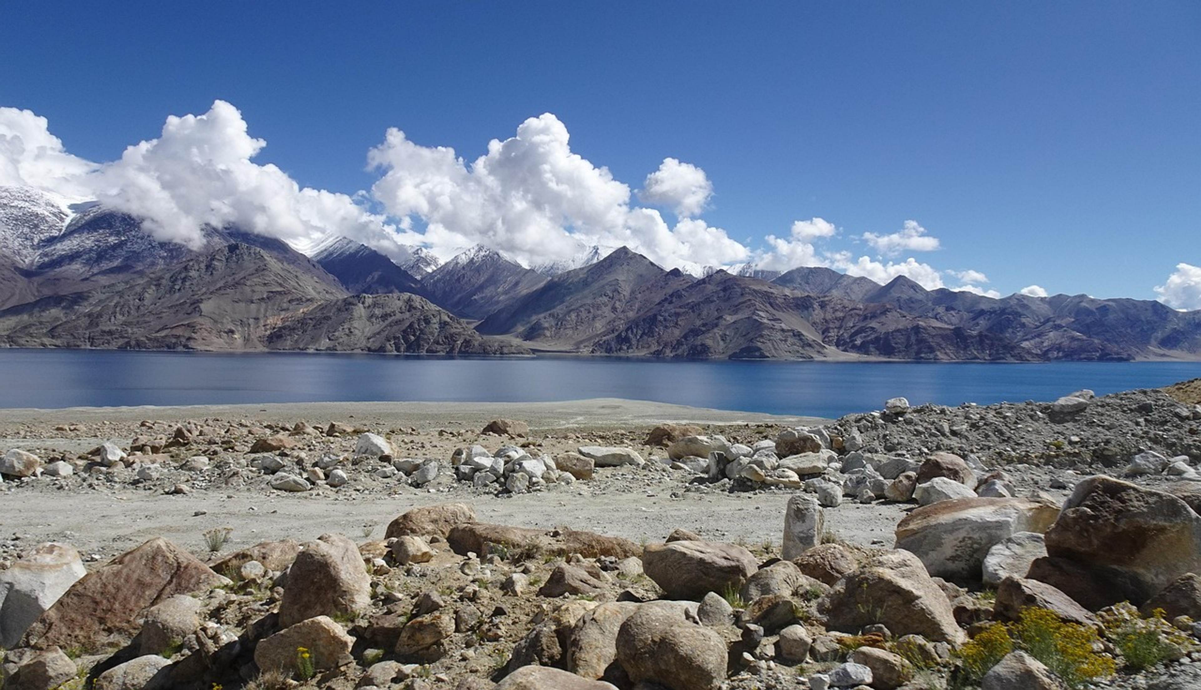A high-altitude lake near Tawang ringed by peaks